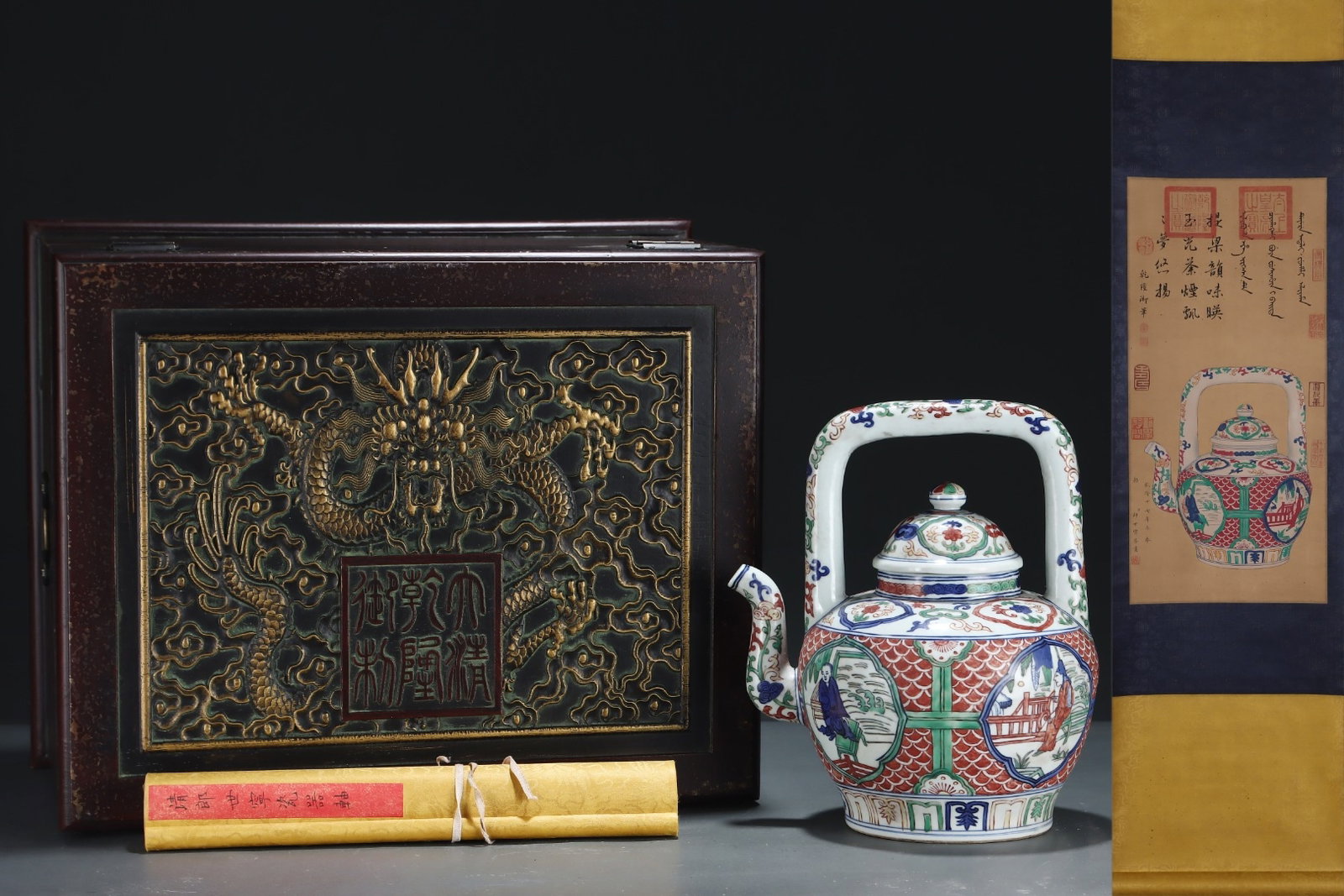 A Rare Wucai Flower and Figure Pattern Loop-Handled Pot,with Chinese Vertical Scroll Ink Painting on: A Rare Wucai Flower and Figure Pattern Loop-Handled Pot,with Chinese Vertical Scroll Ink Painting on Silk,Ming Dynasty,China,Jiajing Six-character Mark,Size:(Without frame)25.2inx11.8in,(Porcelain)12i