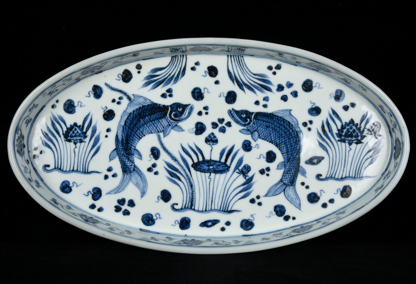A Rare Blue and White Hornwort Pattern Plate: A Rare Blue and White Hornwort Pattern Plate,Ming Dynasty,China,Xuande Six-character Mark,Size:1.6inx14.2inx7.7in 青花鱼藻纹盘子中国明ߣ