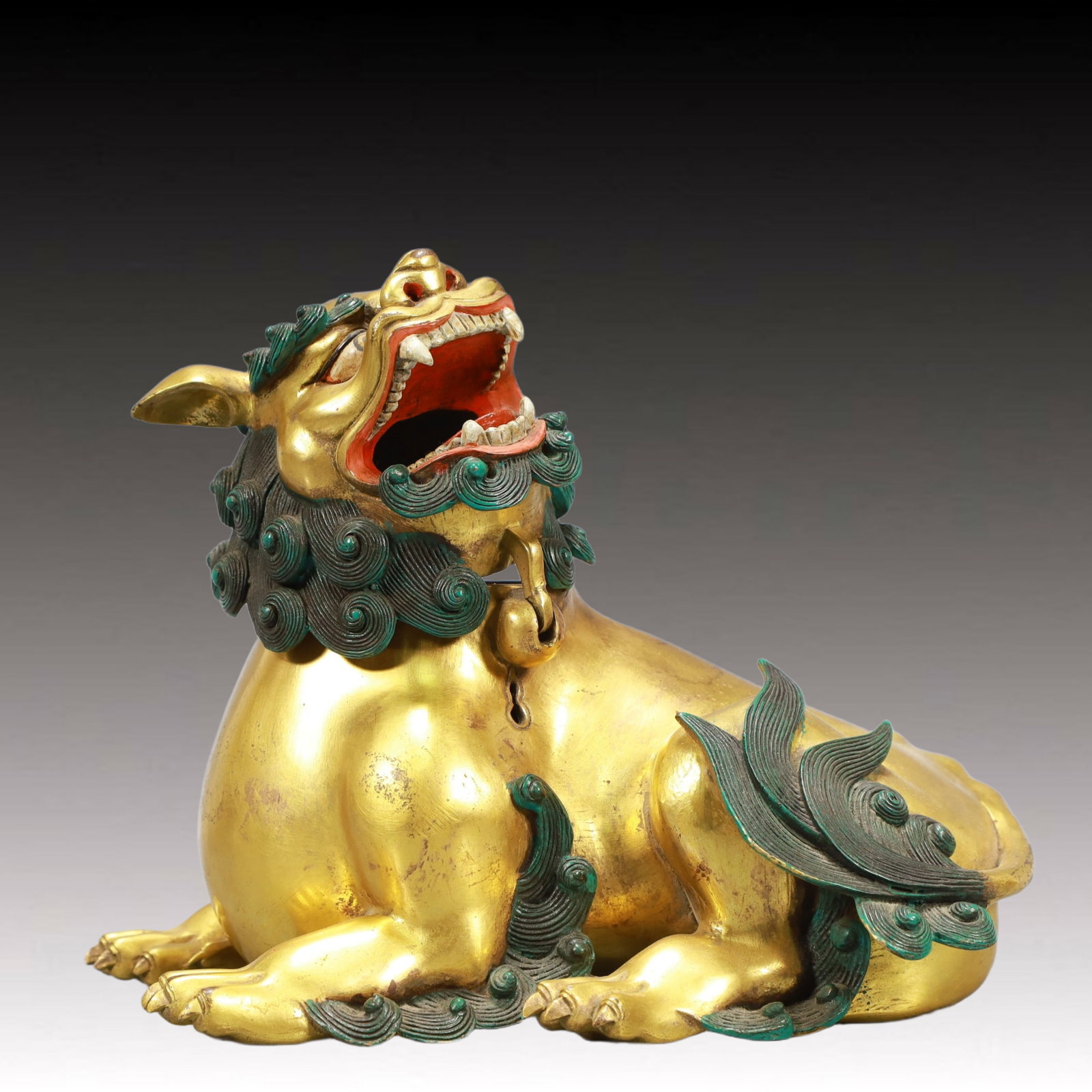 A Rare Gilt Bronze Lion Ornament: A Rare Gilt Bronze Lion Ornament,Qing Dynasty, China,Size:9.1inx5.5inx7.9in,Weight:2950g 铜鎏金狮子摆件,中国清代
