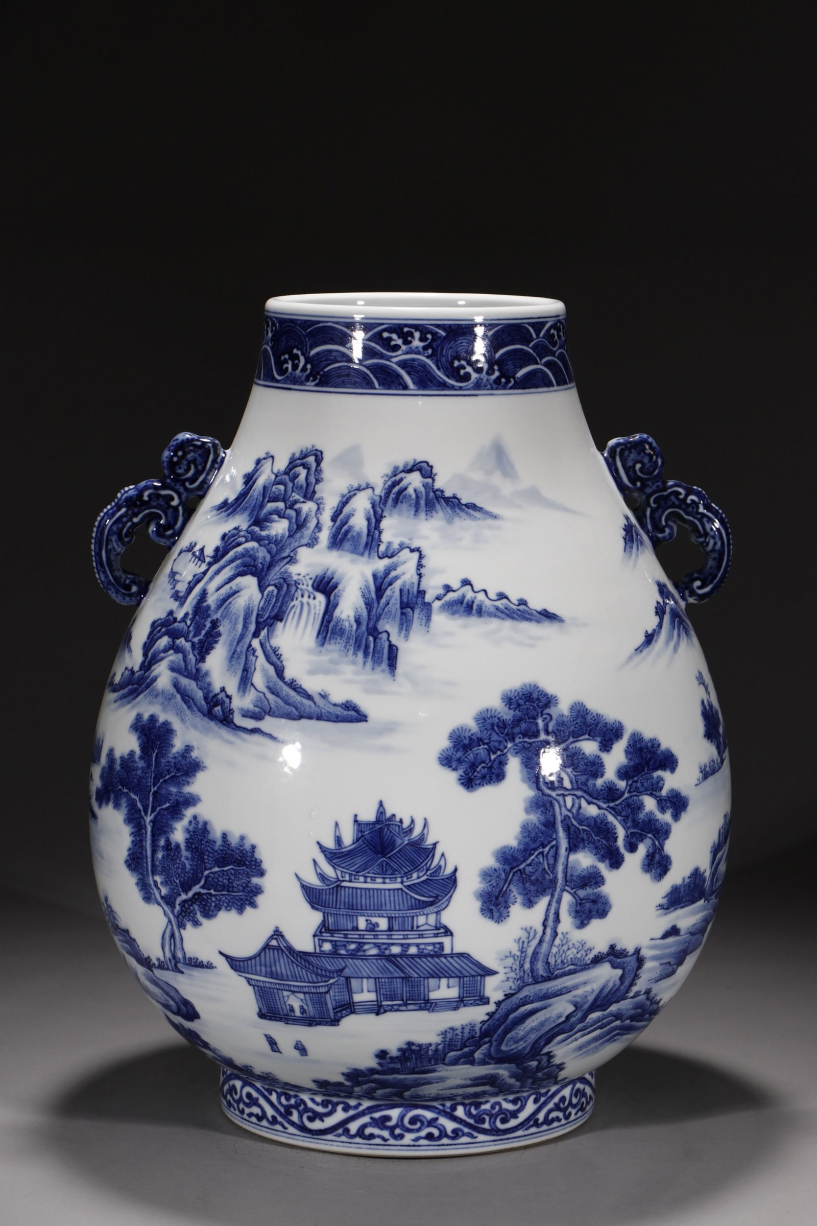 A Rare Blue and White Landscape Pattern Double-Ears Vase: A Rare Blue and White Landscape Pattern Double-Ears Vase,Qing Dynasty,China,Qianlong Six-character Mark,Size:14.4in 青花山水纹双耳瓶中国