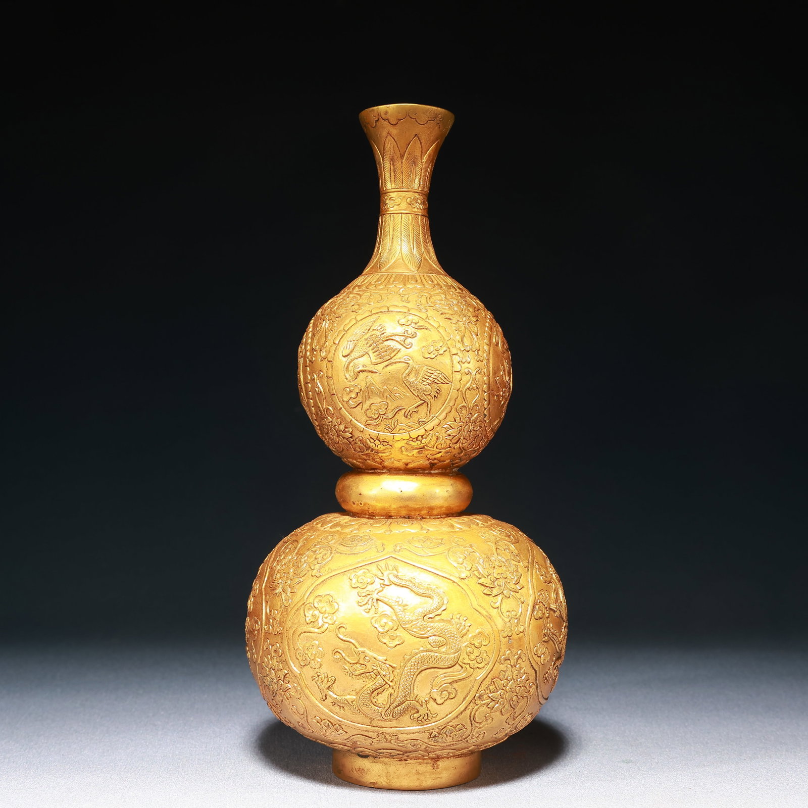 An Exquisite Gilt Bronze Flower,Bird and Dragon Pattern Gourd Vase: An Exquisite Gilt Bronze Flower,Bird and Dragon Pattern Gourd Vase,Qing Dynasty,China,Size:4.5inx9.6in,Weight:650g 铜鎏金花鸟龙纹葫芦瓶,