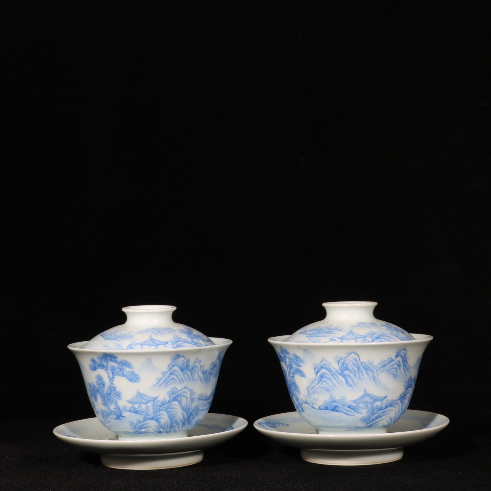A Pair of Exquisite Sapphire Blue Landscape Pattern Cups: A Pair of Exquisite Sapphire Blue Landscape Pattern Cups,Qing Dynasty,China,Yongzheng Four-character Mark,Size:3.9inx4.5in 一对宝石蓝山水纹杯é