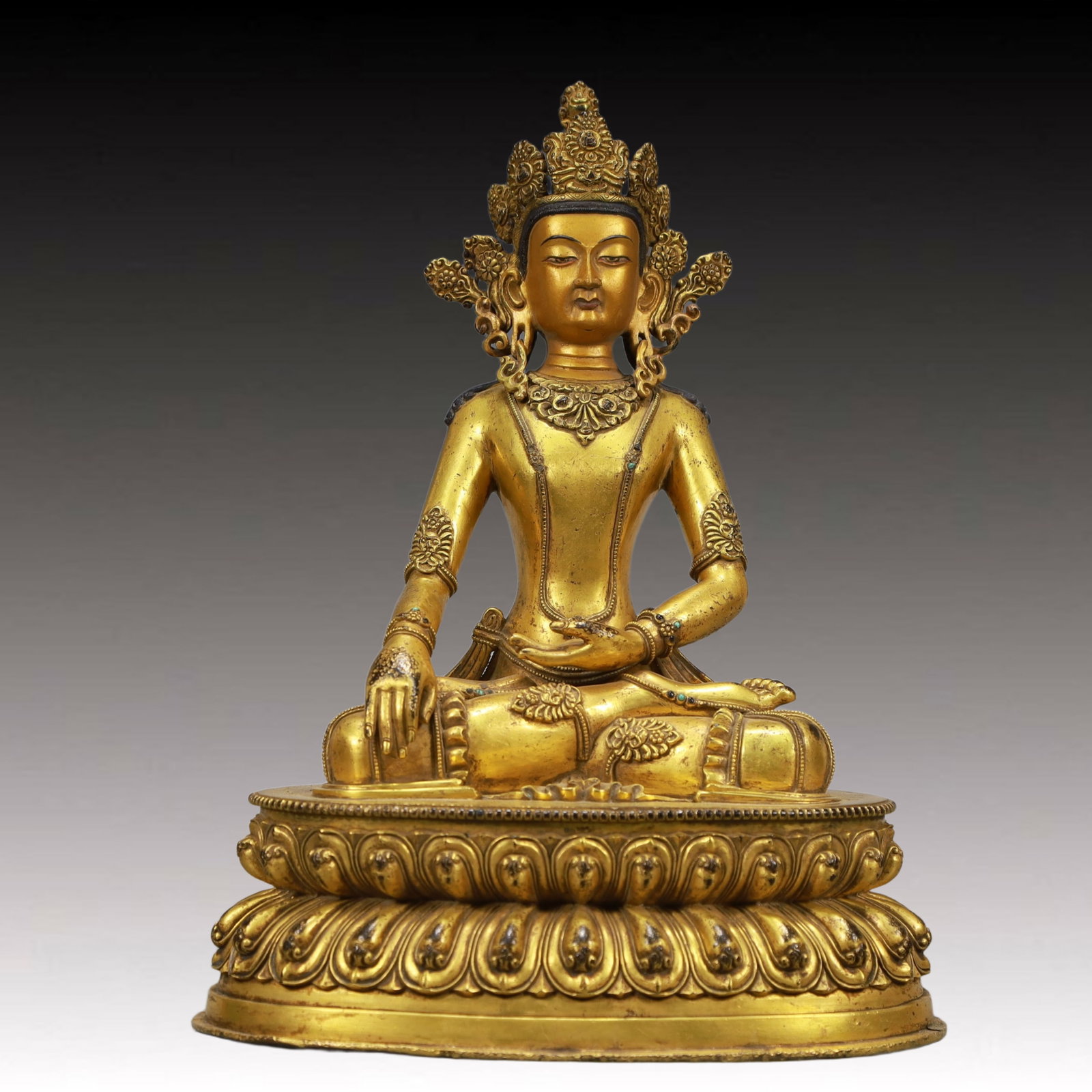 A Solemn Gilt Bronze Statue of Amitayus: A Solemn Gilt Bronze Statue of Amitayus,Ming Dynasty, China,Size:8.5inx4.5inx11in,Weight:3950g 铜鎏金无量寿佛像,中国明代