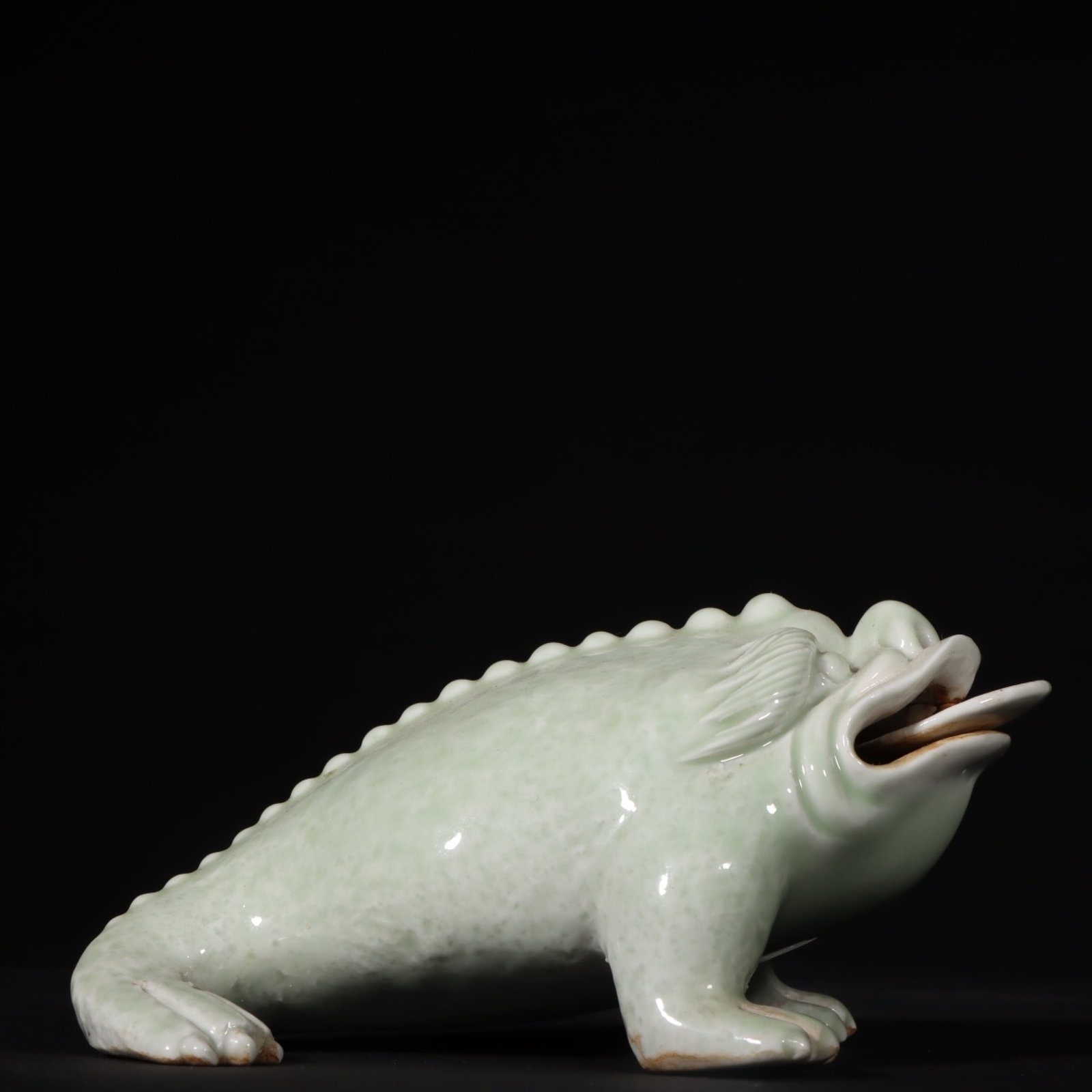 An Exquisite Celadon Glazed Toad Ornament: An Exquisite Celadon Glazed Toad Ornament,Qing Dynasty,China,Size:2.8inx6.3in 青釉蟾蜍摆件,中国清代
