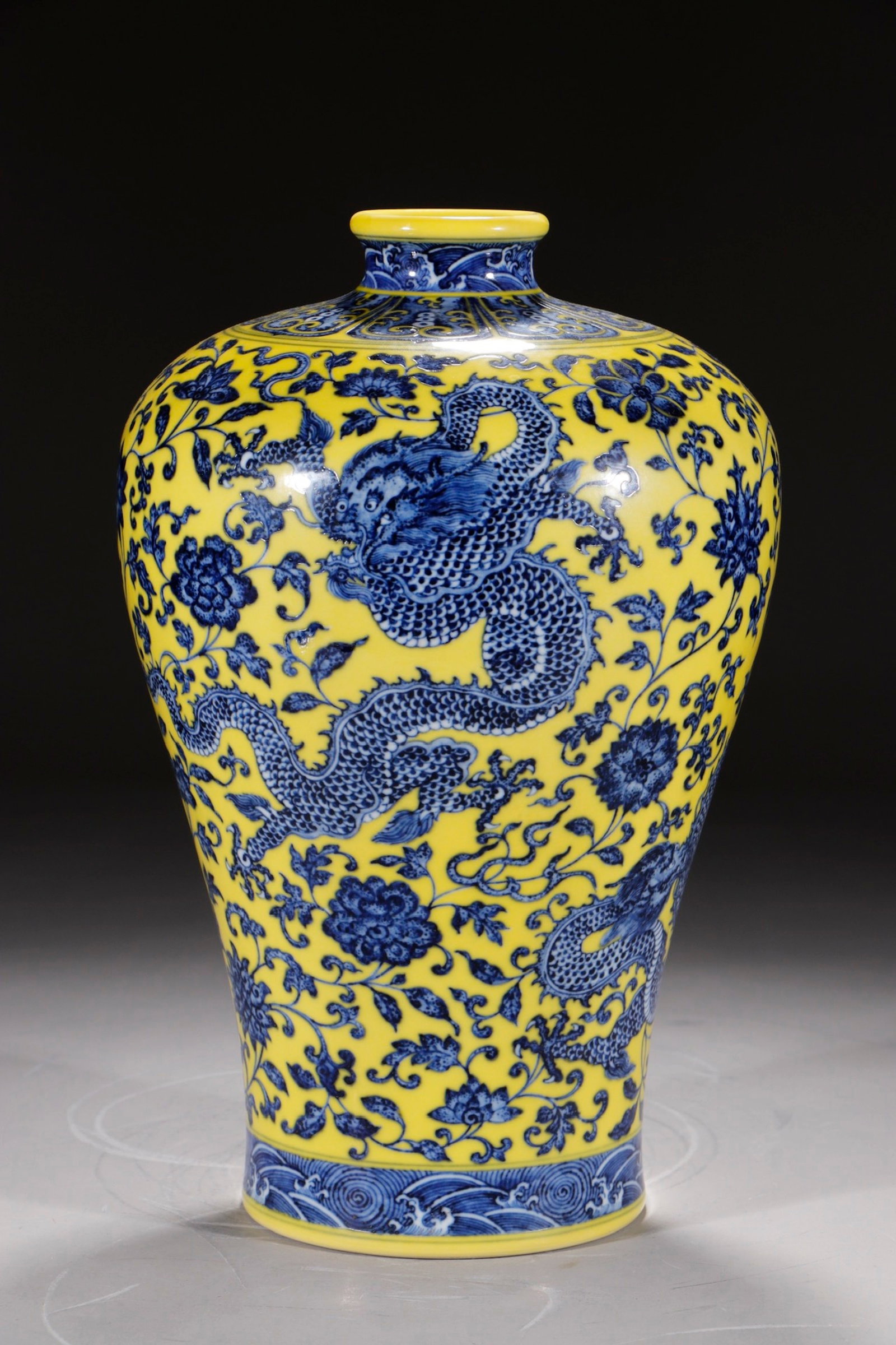 A Rare Yellow Ground Blue and White Lotus and Dragon Pattern Vase: A Rare Yellow Ground Blue and White Lotus and Dragon Pattern Vase,Qing Dynasty,China,Qianlong Six-character Mark,Size:13.8in 黄地青花缠枝莲龙纹