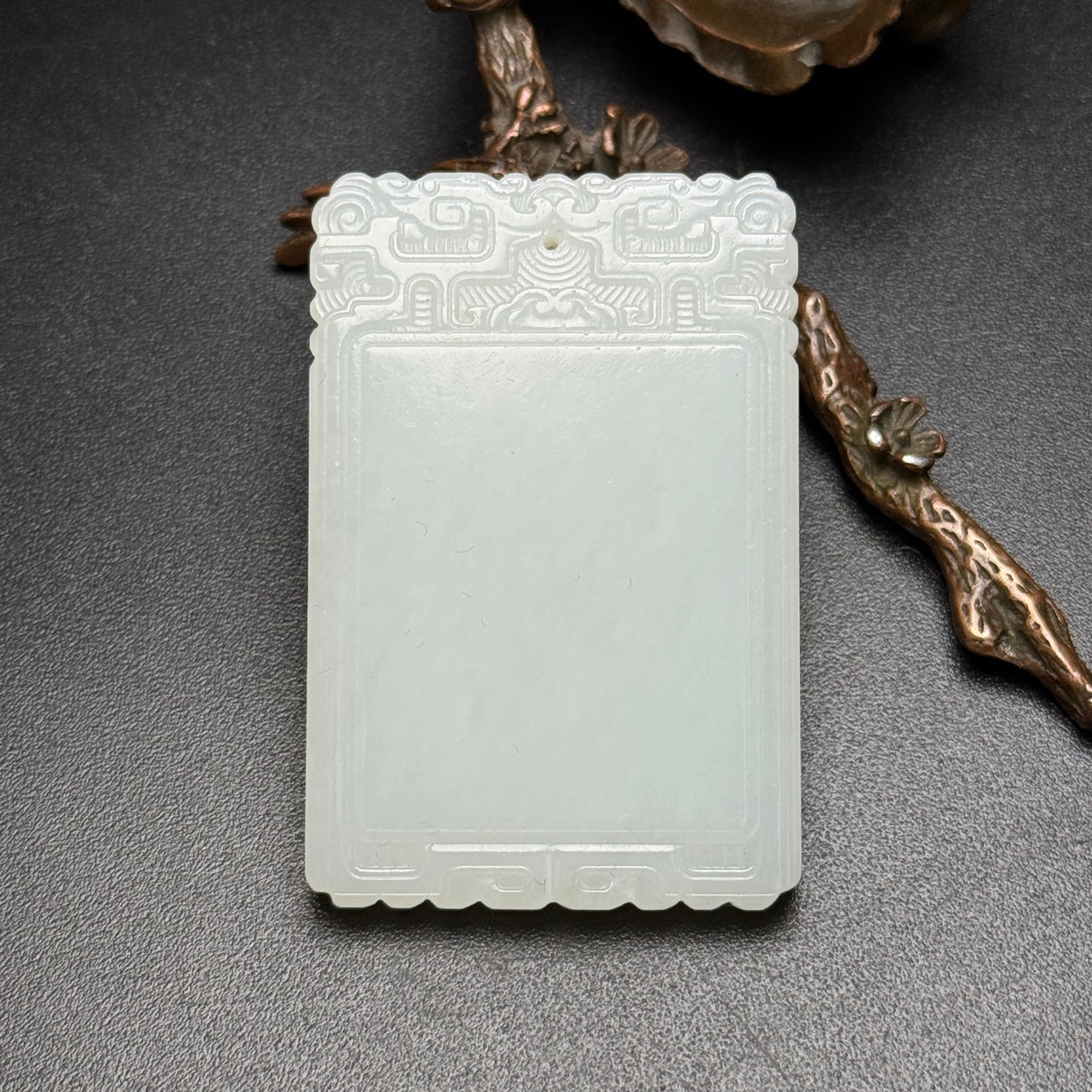 An Exquisite White Jade Pendant: An Exquisite White Jade Pendant,Qing Dynasty,China,Size:1.6inx2.4inx0.2in,Weight:40g 白玉牌,中国清代