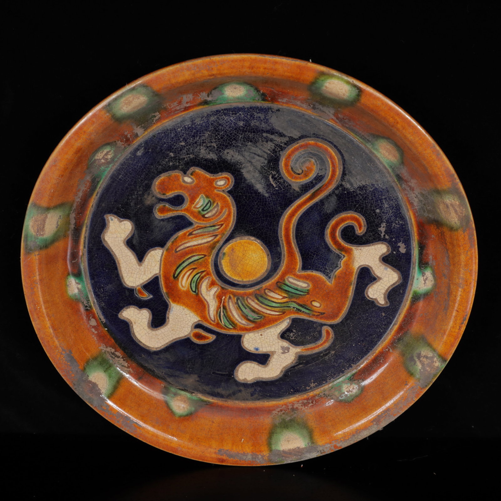 An Exquisite Tang Tri-Color Glazed Pottery Auspicious Beast Plate: An Exquisite Tang Tri-Color Glazed Pottery Auspicious Beast Plate,Tang Dynasty,China,Size:8.7inx8.7inx1.2in,Weight:550g 唐三彩瑞兽盘,中国唐代