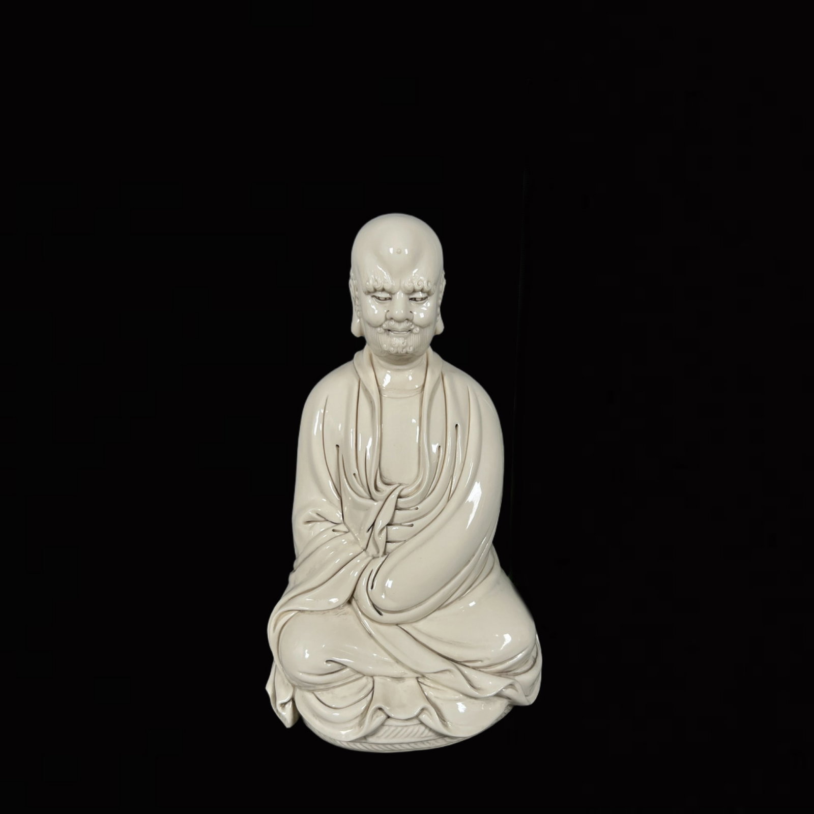 A Solemn Blance-De-Chine Statue of Dharma (1 of 8)
