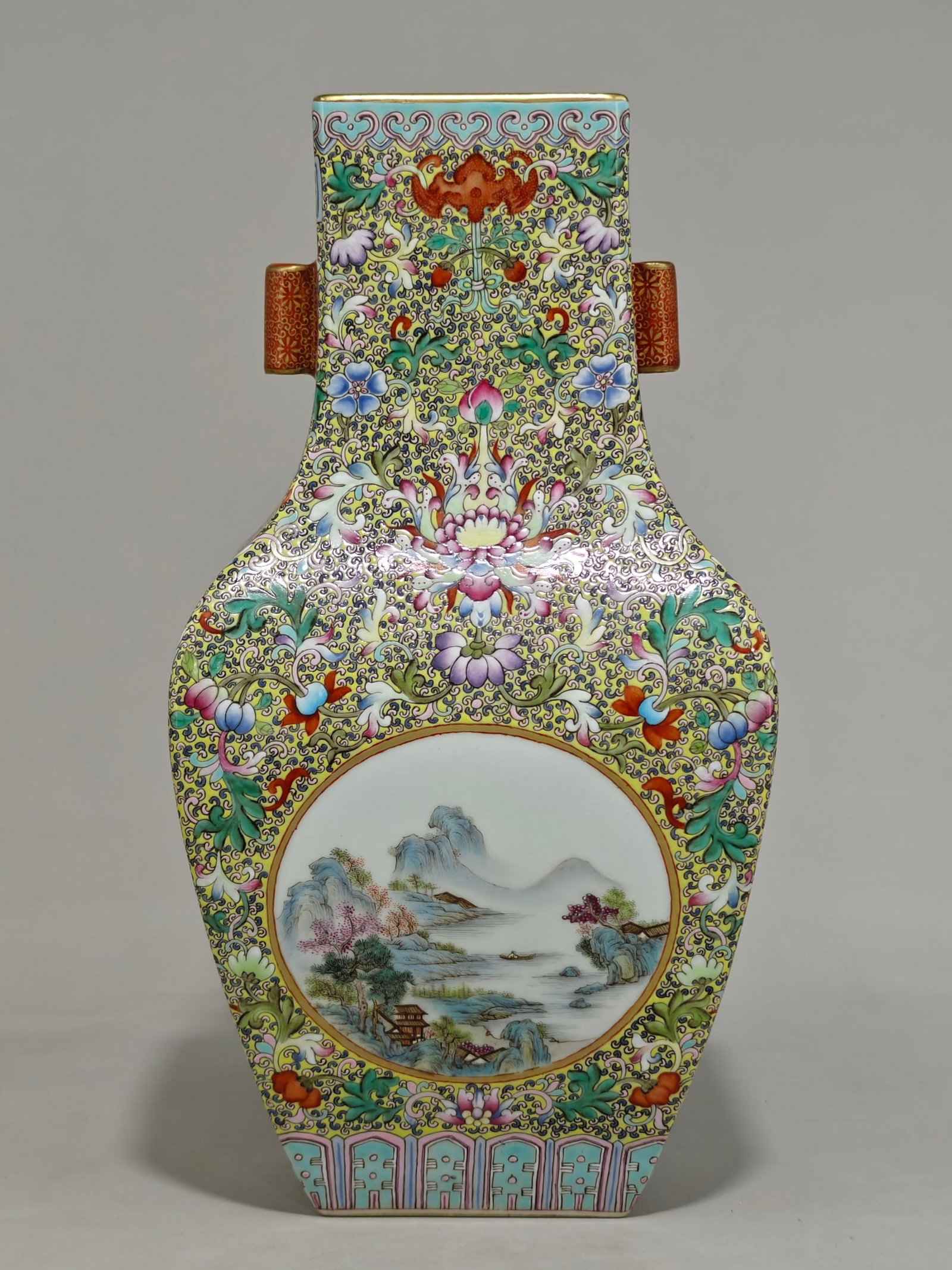 A Rare Famille-Rose Painted Gold Lotus and Landscape Pattern Double-Ears Vase: A Rare Famille-Rose Painted Gold Lotus and Landscape Pattern Double-Ears Vase,Qing Dynasty,China,Qianlong Six-character Mark,Size:12.6inx6.6in 粉彩描金缠枝莲&