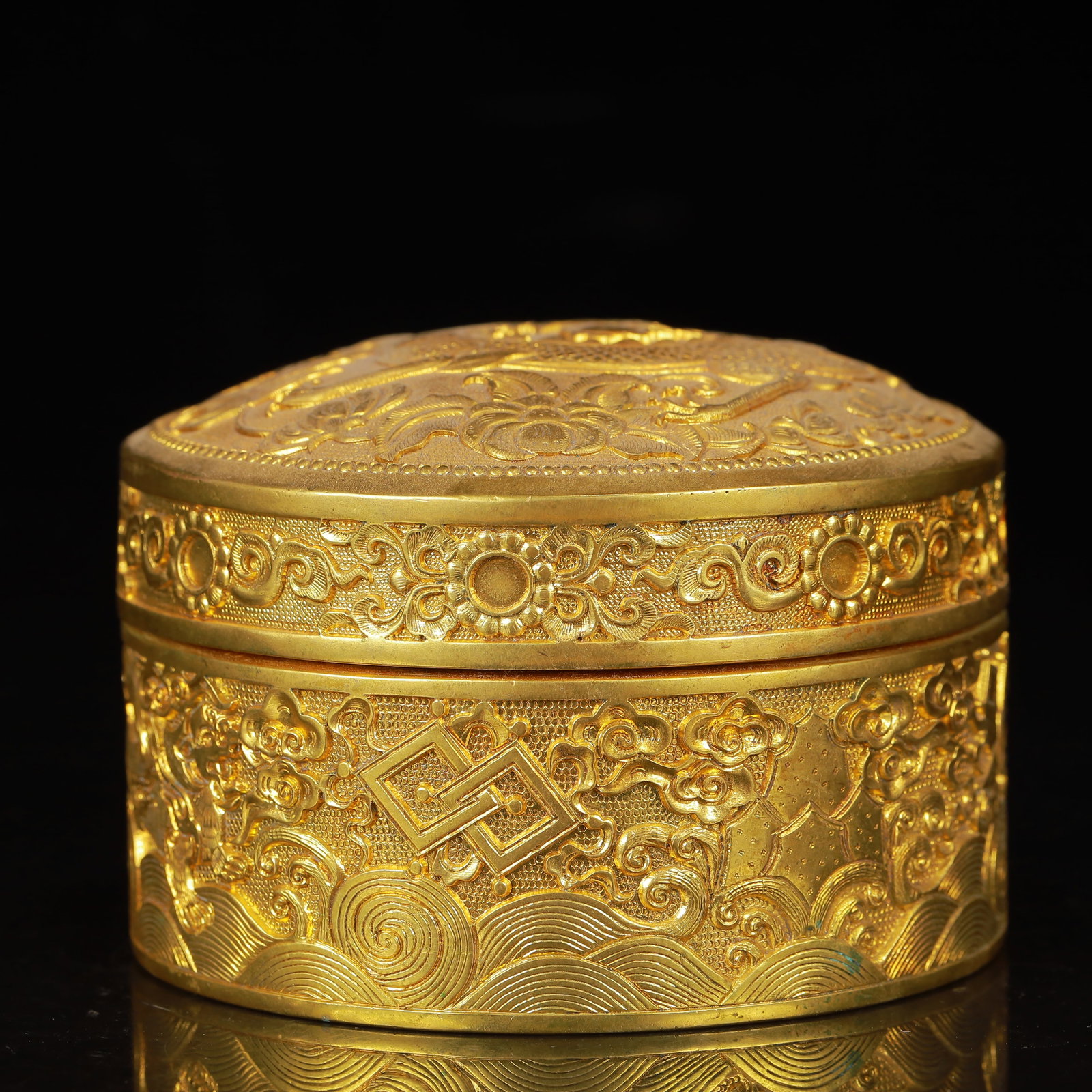 An Exquisite Gilt Bronze Lotus and Dragon Pattern Cover Box: An Exquisite Gilt Bronze Lotus and Dragon Pattern Cover Box,Qing Dynasty,China,Size:4.1inx2.8in,Weight:956g 铜鎏金缠枝莲龙纹盖盒,中