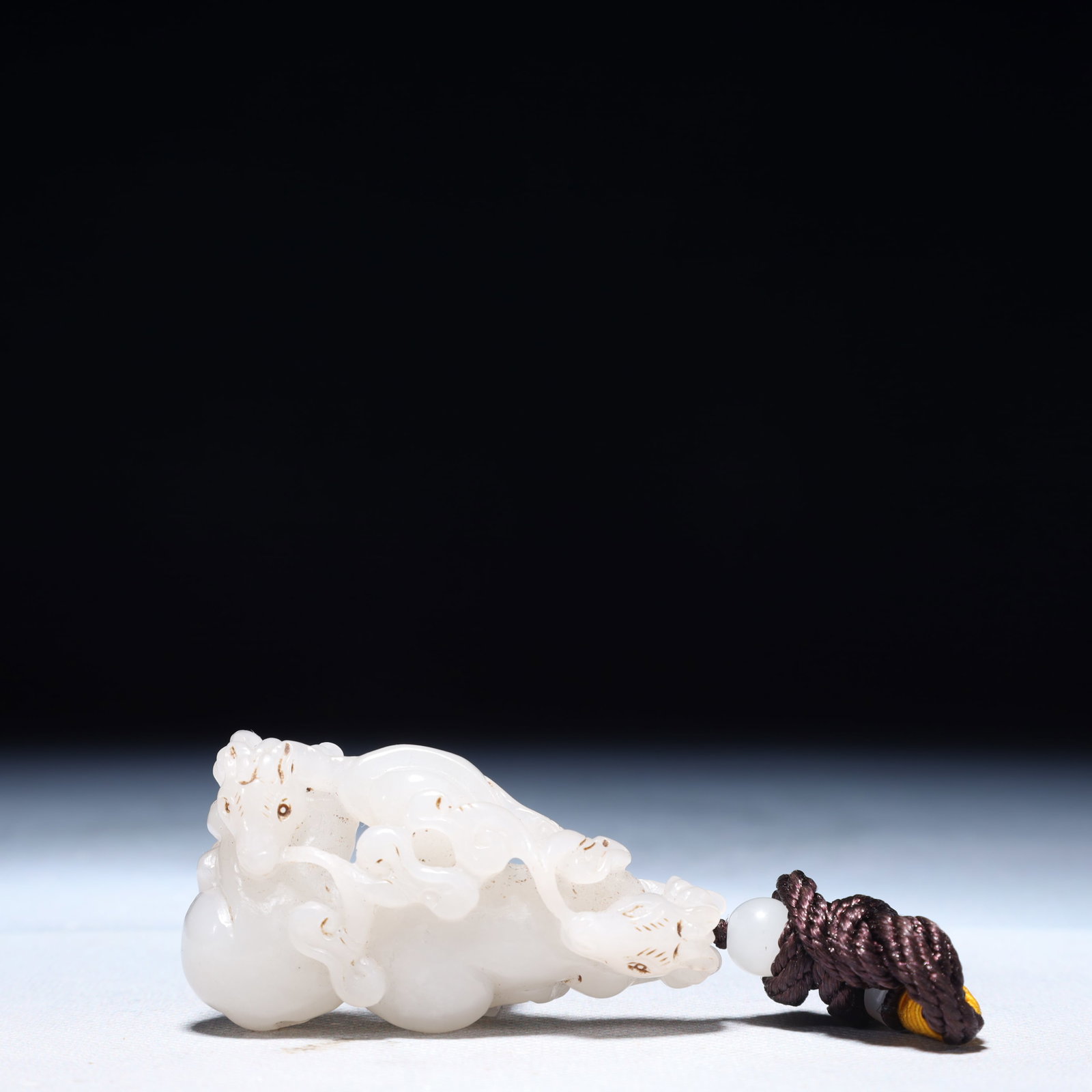 An Exquisite White Jade Auspicious Beast Pendant: An Exquisite White Jade Auspicious Beast Pendant,Qing Dynasty,China,Size:2.6inx1.4inx0.6in,Weight:56g 白玉瑞兽挂件,中国清代