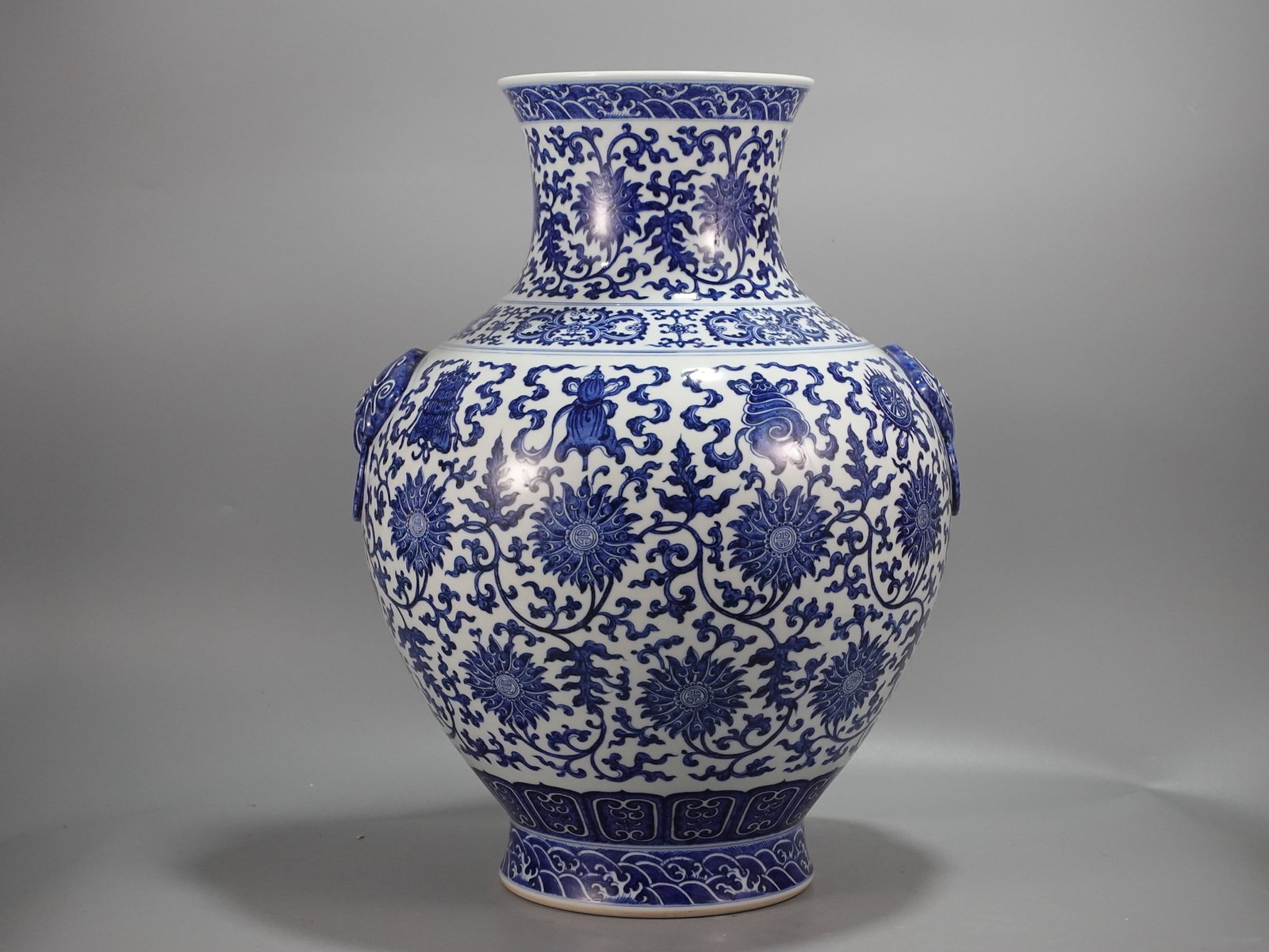 A Huge Blue and White Lotus Eight Treasures Pattern Double-Ears Vase: A Huge Blue and White Lotus Eight Treasures Pattern Double-Ears Vase,Qing Dynasty,China,Qianlong Six-character Mark,Size:21.7inx17.7in
