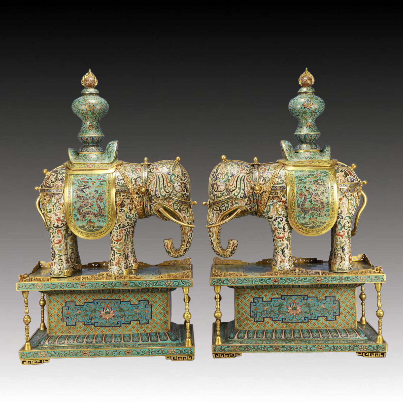 A Pair of Exquisite Cloisonne Dragon Pattern Elephant Ornaments: A Pair of Exquisite Cloisonne Dragon Pattern Elephant Ornaments,Qing Dynasty, China,Qianlong Six-character Mark,Size：14.8inx8.3inx24.8in; Weight：23700