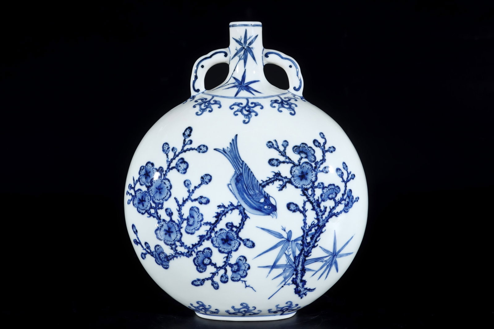 An Exquisite Blue and White Flower and Bird Pattern Double-Ears Vase: An Exquisite Blue and White Flower and Bird Pattern Double-Ears Vase,Qing Dynasty,China,Qianlong Six-character Mark,Size:11.6inx9.8in 青花花鸟纹双耳瓶&#