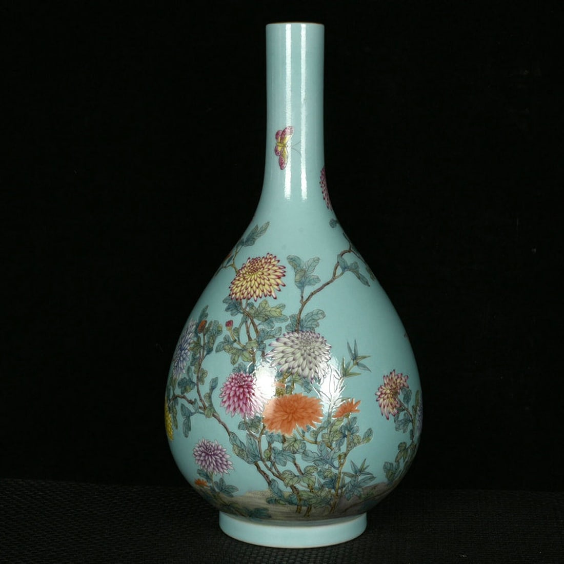 A Rare Green Ground Enamel Flower and Butterfly Pattern Vase: A Rare Green Ground Enamel Flower and Butterfly Pattern Vase,Qing Dynasty,China,Qianlong Six-character Mark,Size:12.8inx7.1in 绿地珐琅彩花卉蝴蝶&#