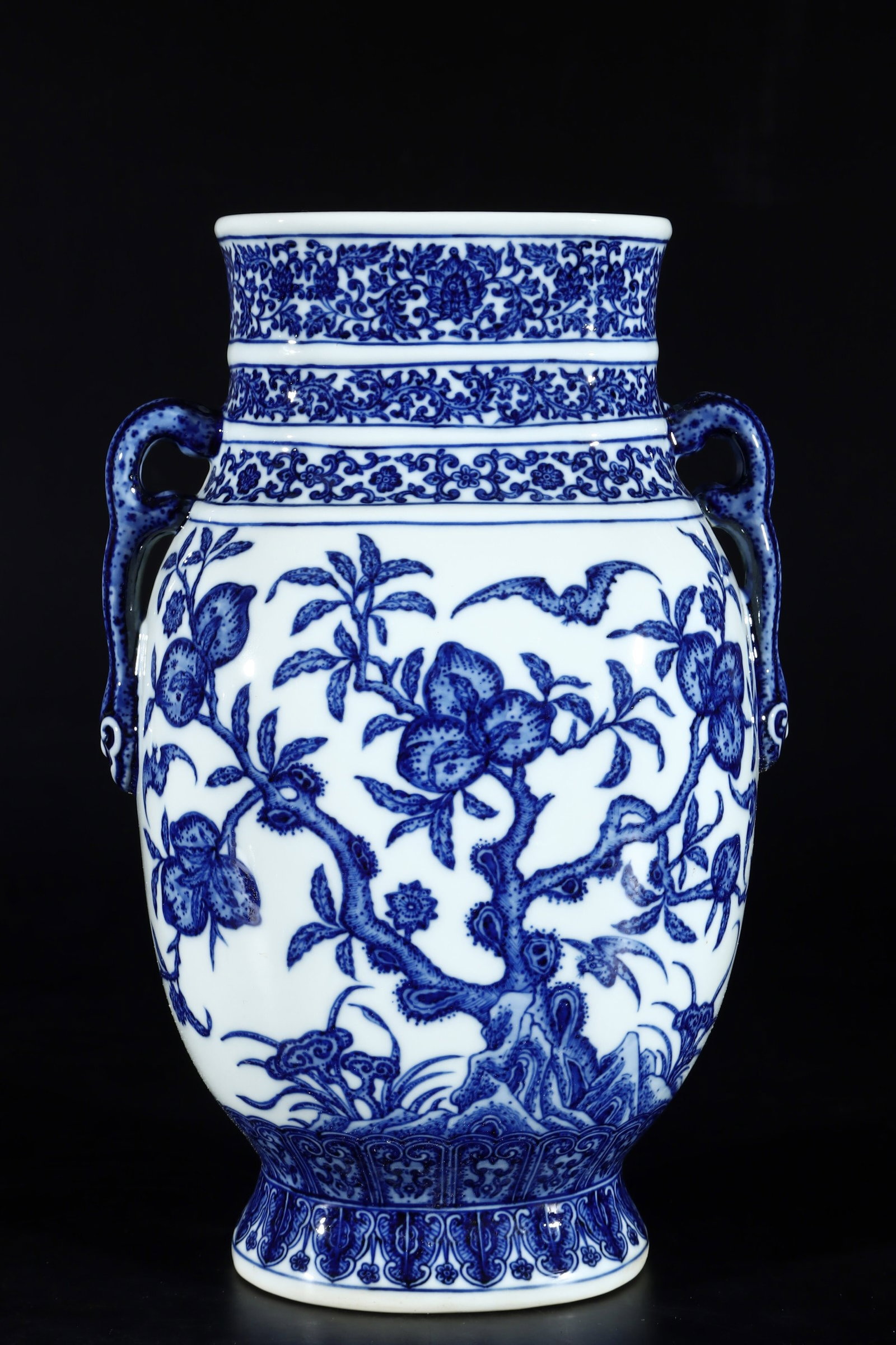 A Rare Blue and White Bats and Peach Pattern Double-Ears Vase: A Rare Blue and White Bats and Peach Pattern Double-Ears Vase,Qing Dynasty,China,Qianlong Six-character Mark,Size:12.8inx8.5in 青花福寿纹双耳瓶中&