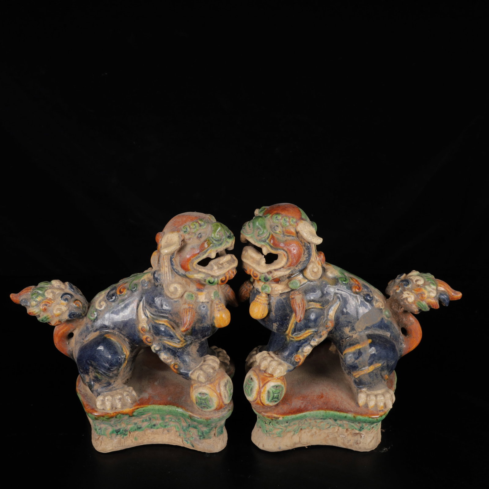 A Pair of Exquisite Tang Tri-Color Glazed Pottery Lion Ornaments: A Pair of Exquisite Tang Tri-Color Glazed Pottery Lion Ornaments,Tang Dynasty,China,Size:7.1inx7.1inx3.9in,Weight:1580g 一对唐三彩狮子摆件,中