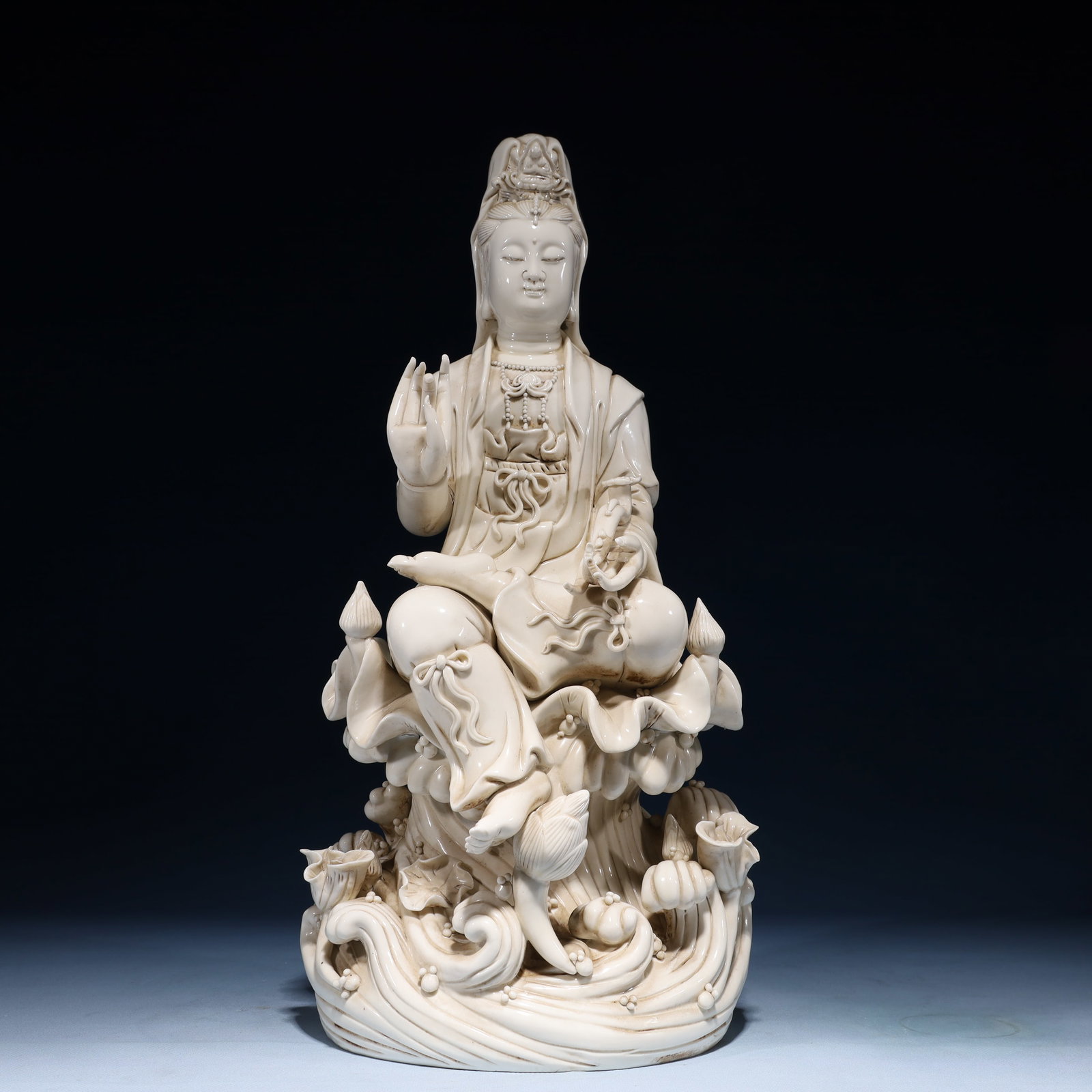 A Solemn Blance-De-Chine Statue of Avalokitesvara: A Solemn Blance-De-Chine Statue of Avalokitesvara Blance-De-Chine Statue of Avalokitesvara,Ming Dynasty,China,He Chaozong Mark,Size:18.1inx8.7inx6.7in,Weight:4400g 德化瓷观&