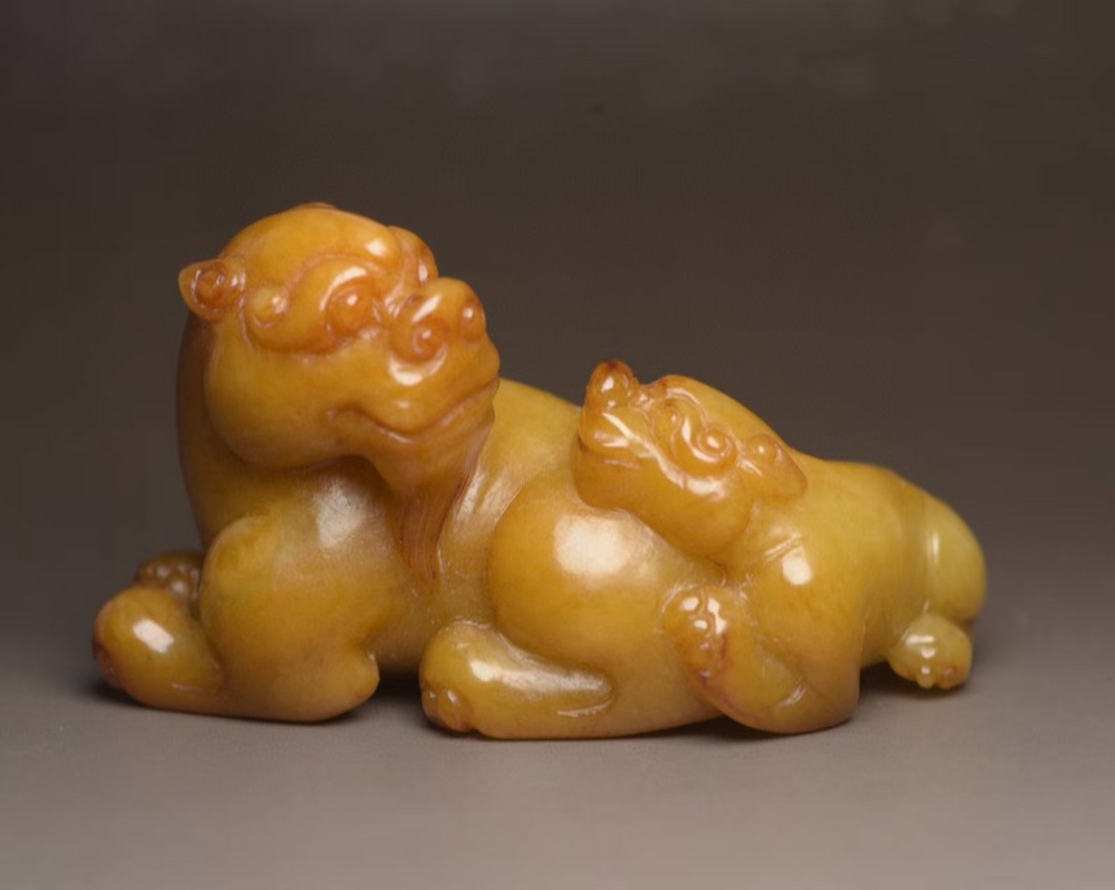 An Exquisite White Jade Auspicious Beast Ornament: An Exquisite White Jade Auspicious Beast Ornament,Qing Dynasty,China,Size:3.3inx1.9inx1.8in,Weight:166g 白玉瑞兽摆件,中国清代