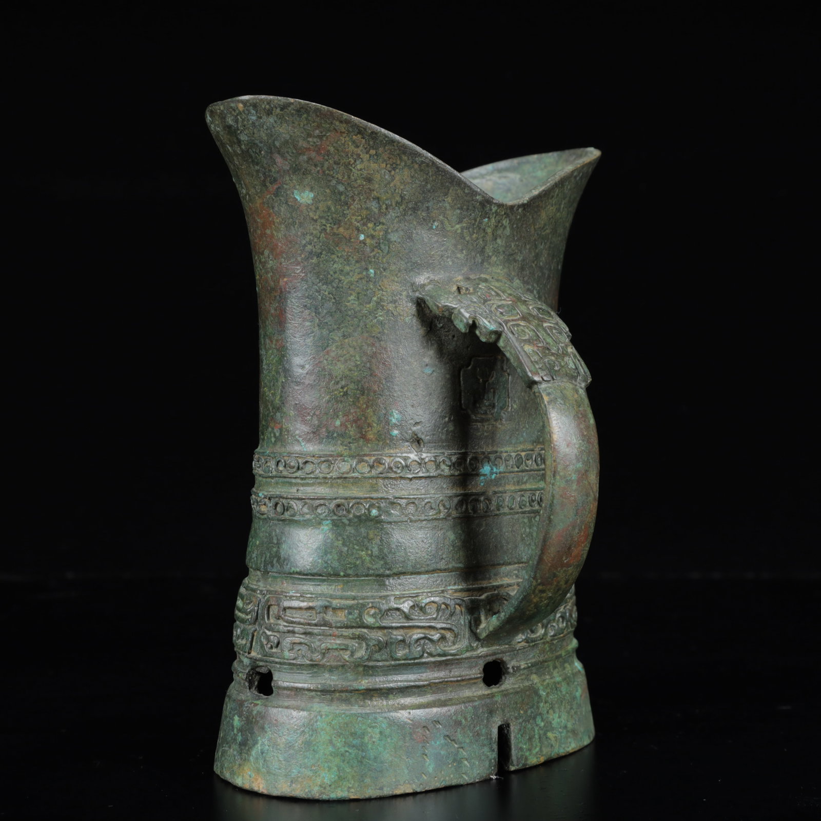 An Archaic Bronze Beast-Face Pattern Libation Cup - 6