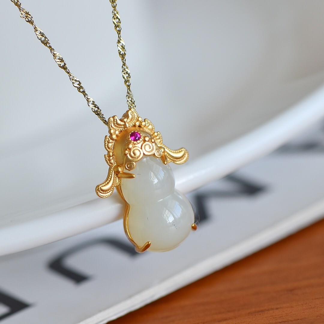 An Exquisite Sterling Silver-Gold Plated Inlaid White Jade Gourd-Shaped Pendant: An Exquisite Sterling Silver-Gold Plated Inlaid White Jade Gourd-Shaped Pendant , Size :0.4inx0.7in