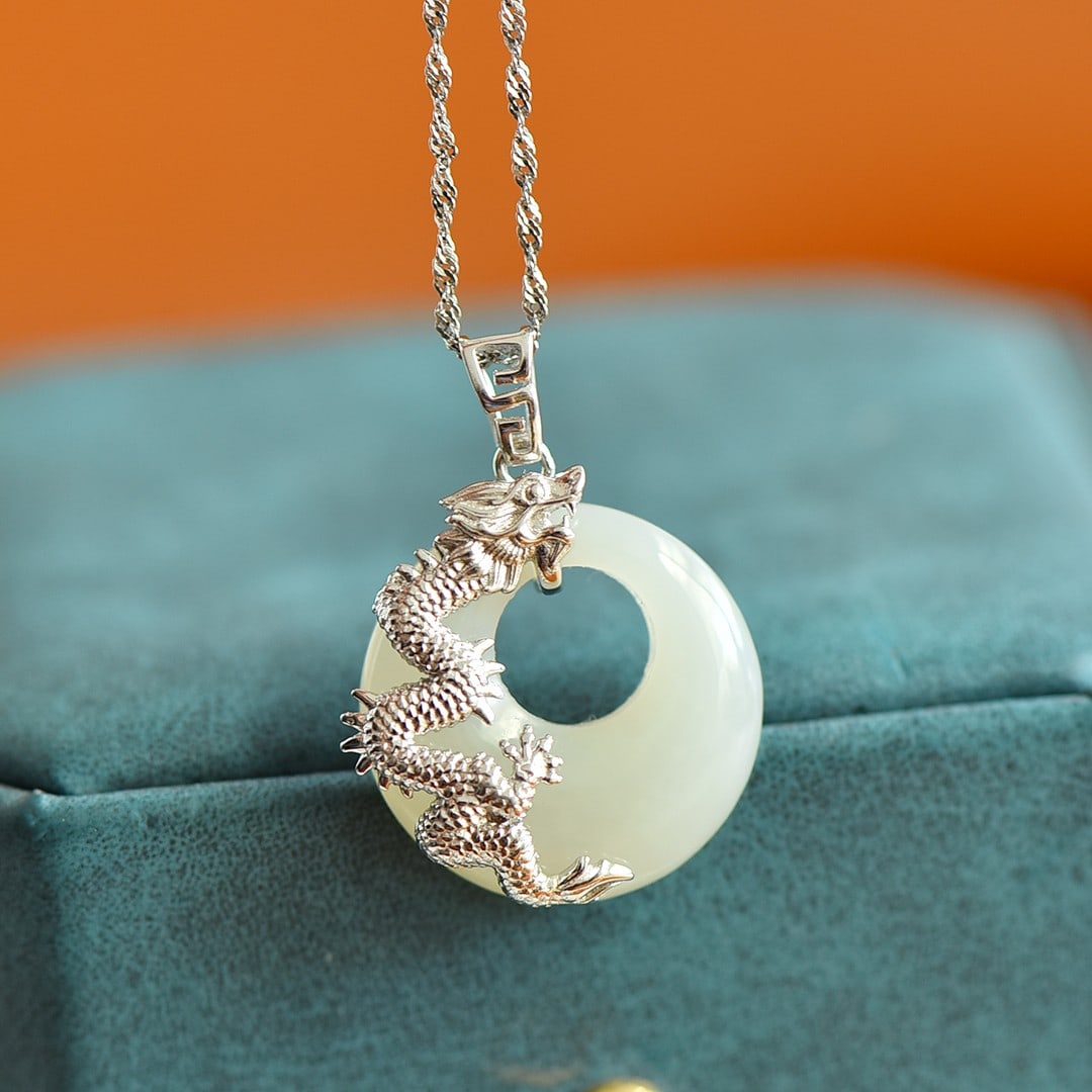 An Exquisite Sterling Silver Inlaid White Jade Pendant: An Exquisite Sterling Silver Inlaid White Jade Pendant , Size :0.8inx0.8in 纯银镶白玉吊坠,尺寸:0.8inx0.8in