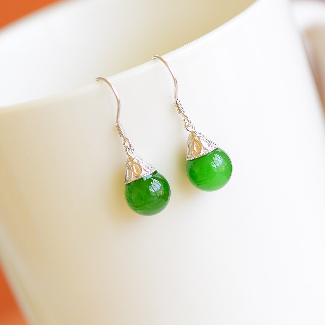A Pair of Exquisite Sterling Silver Inlaid White Jade Earrings: A Pair of Exquisite Sterling Silver Inlaid White Jade Earrings , Size :0.4inx0.4in 一对纯银镶白玉耳环,尺寸:0.4inx0.4in