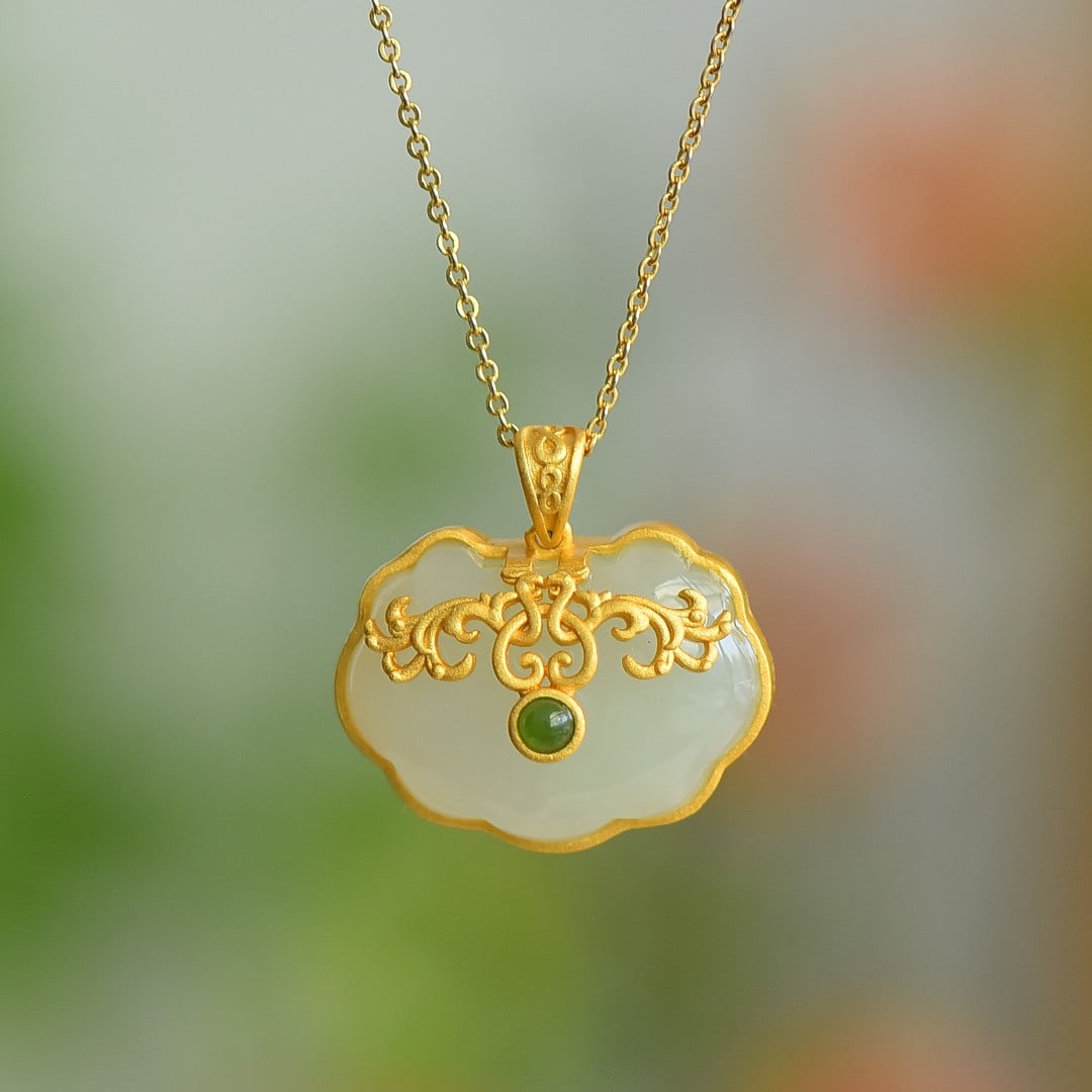 An Exquisite Sterling Silver-Gold Plated Inlaid White Jade Pendant: An Exquisite Sterling Silver-Gold Plated Inlaid White Jade Pendant 纯银镀金镶白玉吊坠