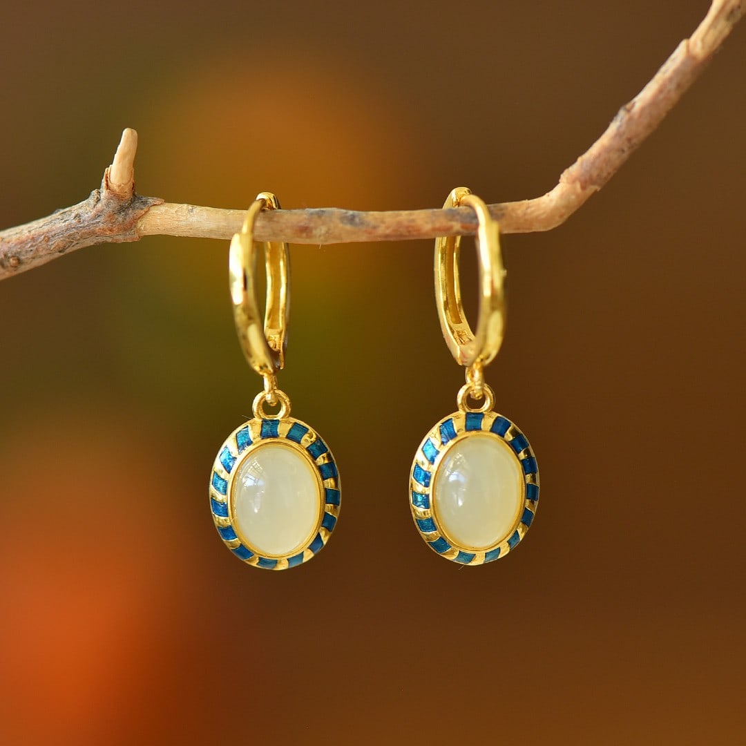 A Pair of Exquisite Sterling Silver-Gold Plated Inlaid White Jade Earrings: A Pair of Exquisite Sterling Silver-Gold Plated Inlaid White Jade Earrings 一对纯银镀金镶白玉耳环