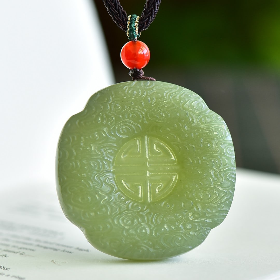 An Exquisite Greenish Jade Auspicious Cloud Pattern Pendant: An Exquisite Greenish Jade Auspicious Cloud Pattern Pendant,Size:1.9inx1.9in 青玉祥云纹挂件