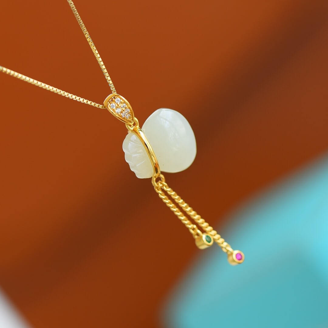 An Exquisite Sterling Silver-Gold Plated Inlaid White Jade Pendant , Inlaid Diamond: An Exquisite Sterling Silver-Gold Plated Inlaid White Jade Pendant , Inlaid Diamond , Size :0.5inx0.6in