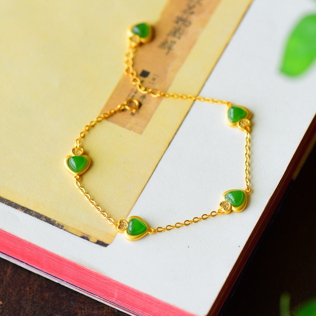 An Exquisite Sterling Silver-Gold Plated Inlaid Jasper Bracelet: An Exquisite Sterling Silver-Gold Plated Inlaid Jasper Bracelet,Size:0.4inx0.7in 纯银镀金镶碧玉手链