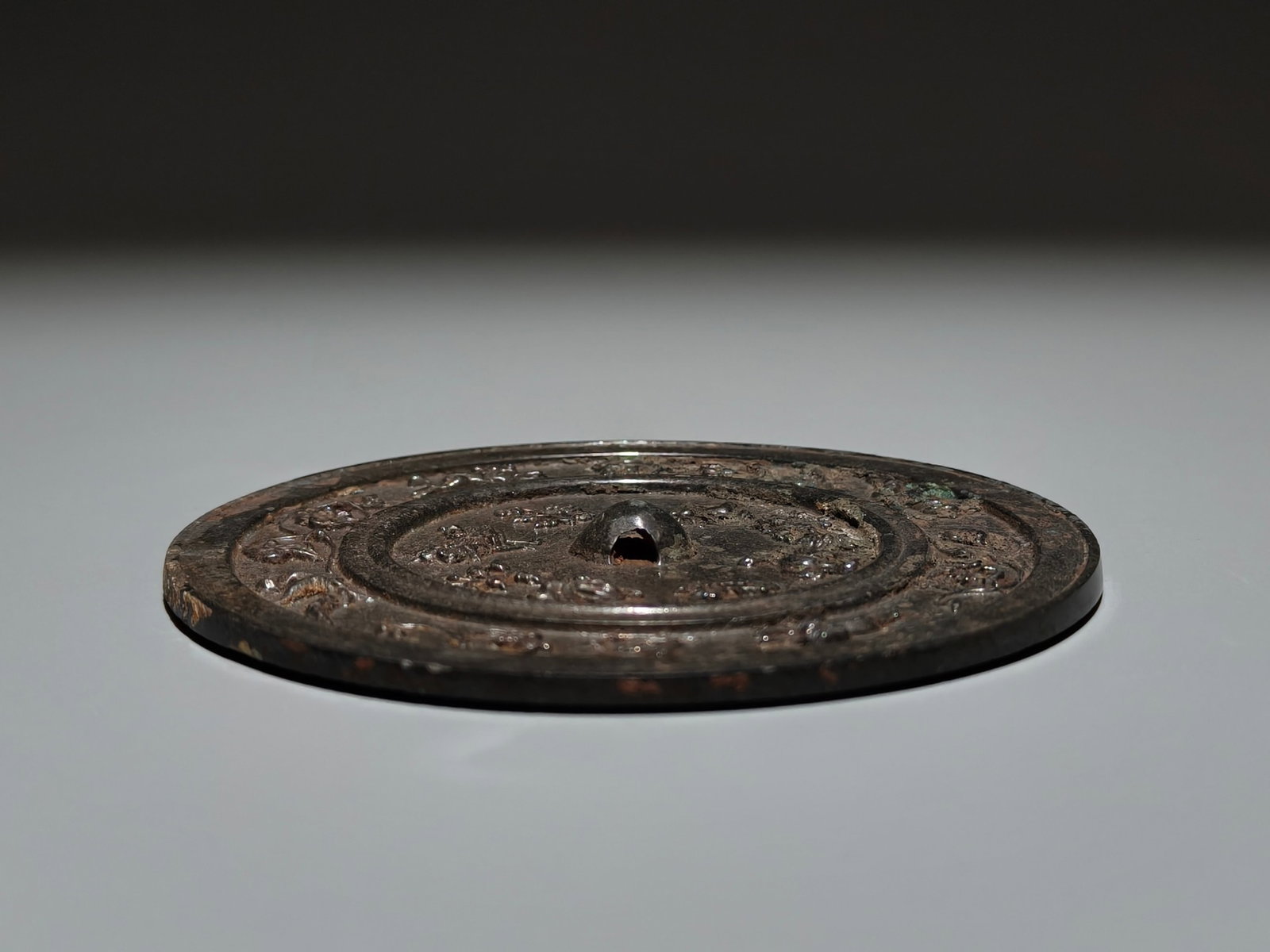 An Archaic Bronze Flower Pattern Mirror - 9