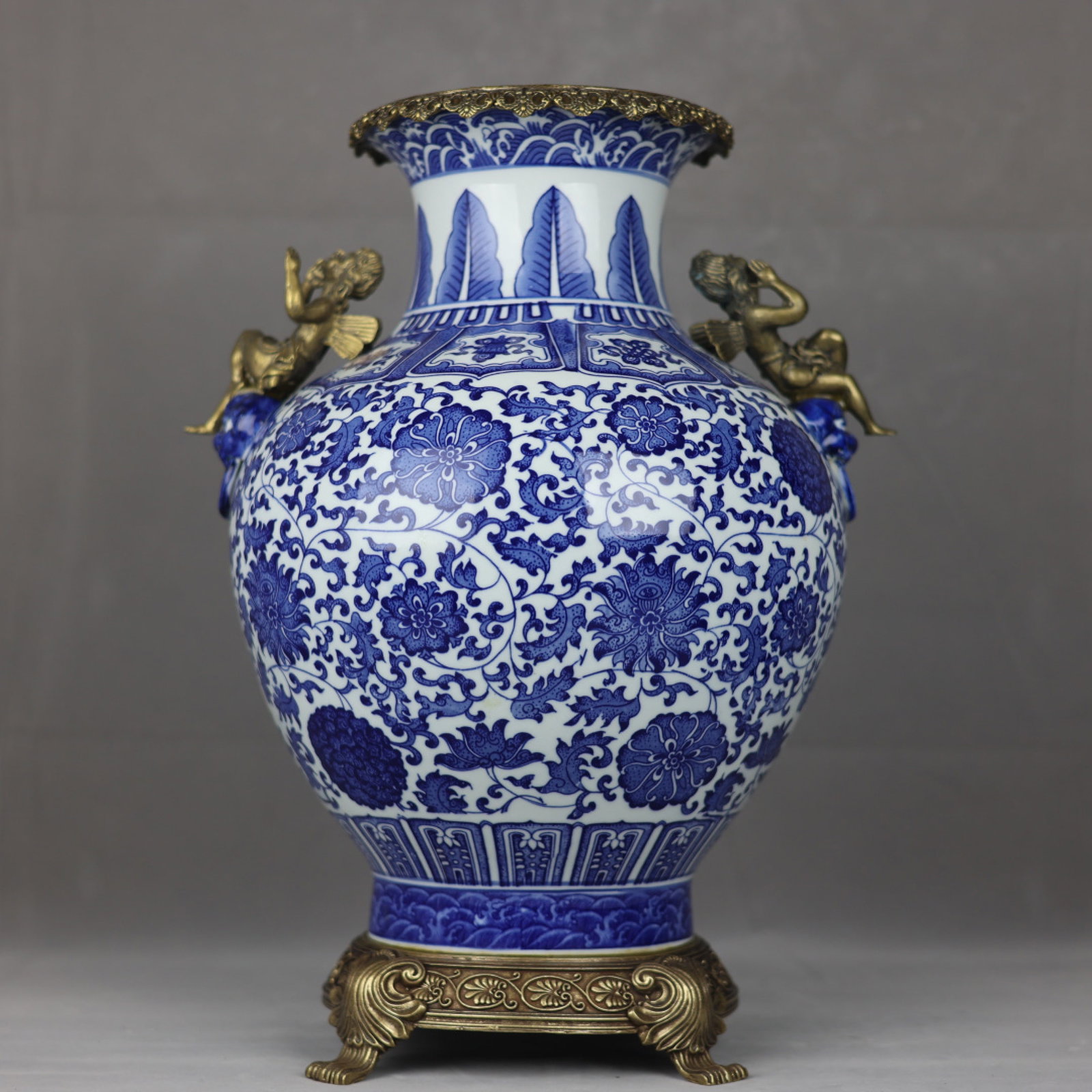 A Huge Blue and White Inlaid Bronze Lotus Pattern Figure-Ears Vase: A Huge Blue and White Inlaid Bronze Lotus Pattern Figure-Ears Vase,Qing Dynasty,China,Qianlong Six-character Mark,Size:18.9inx7.7inx13.8inx7.9in 青花镶铜缠枝莲