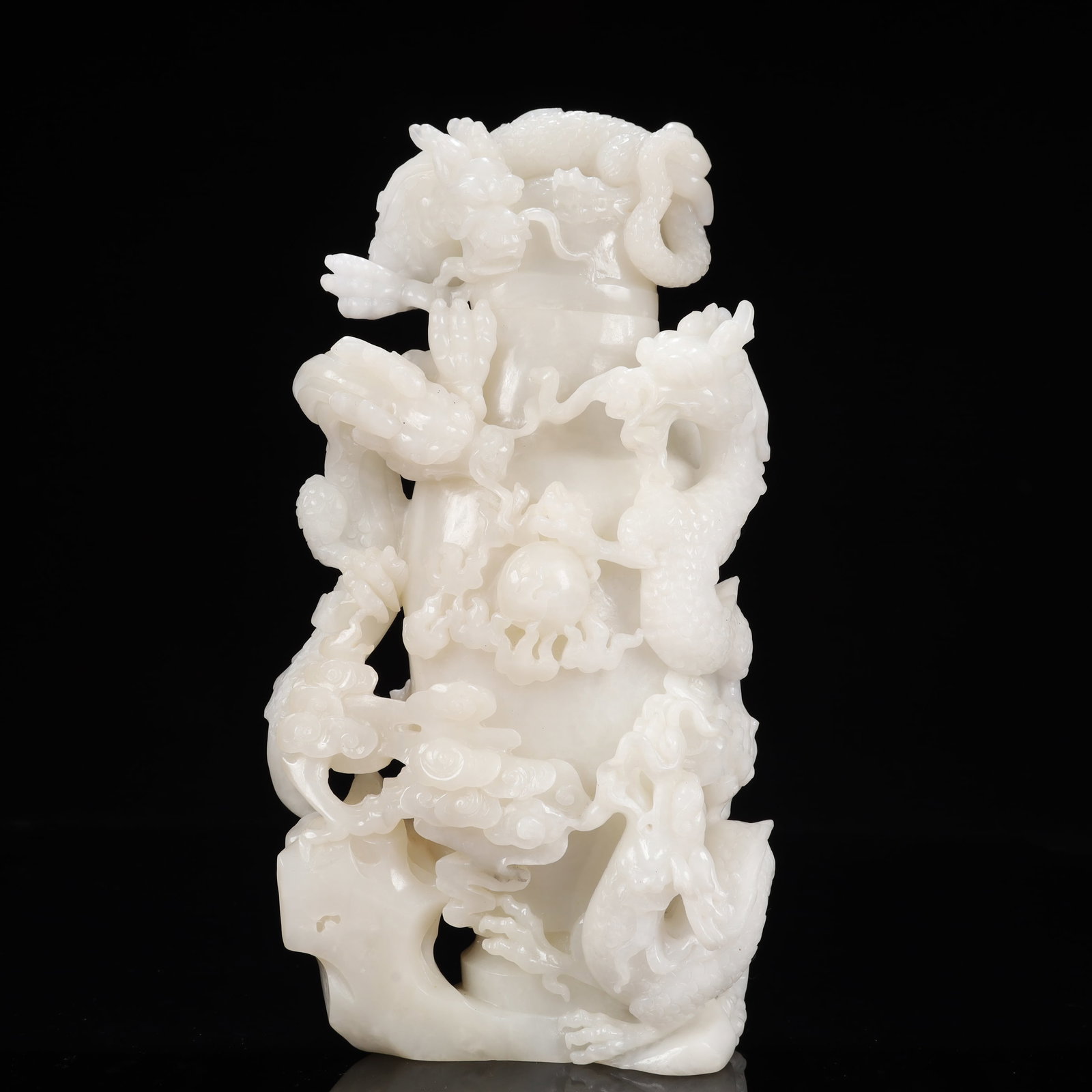 A Rare White Jade Auspicious Cloud and Dragon Pattern Bottle: A Rare White Jade Auspicious Cloud and Dragon Pattern Bottle,Qing Dynasty, China,Size:6.3inx3.1inx12.6in,Weight:3950g 白玉祥云龙纹盖瓶,中国&