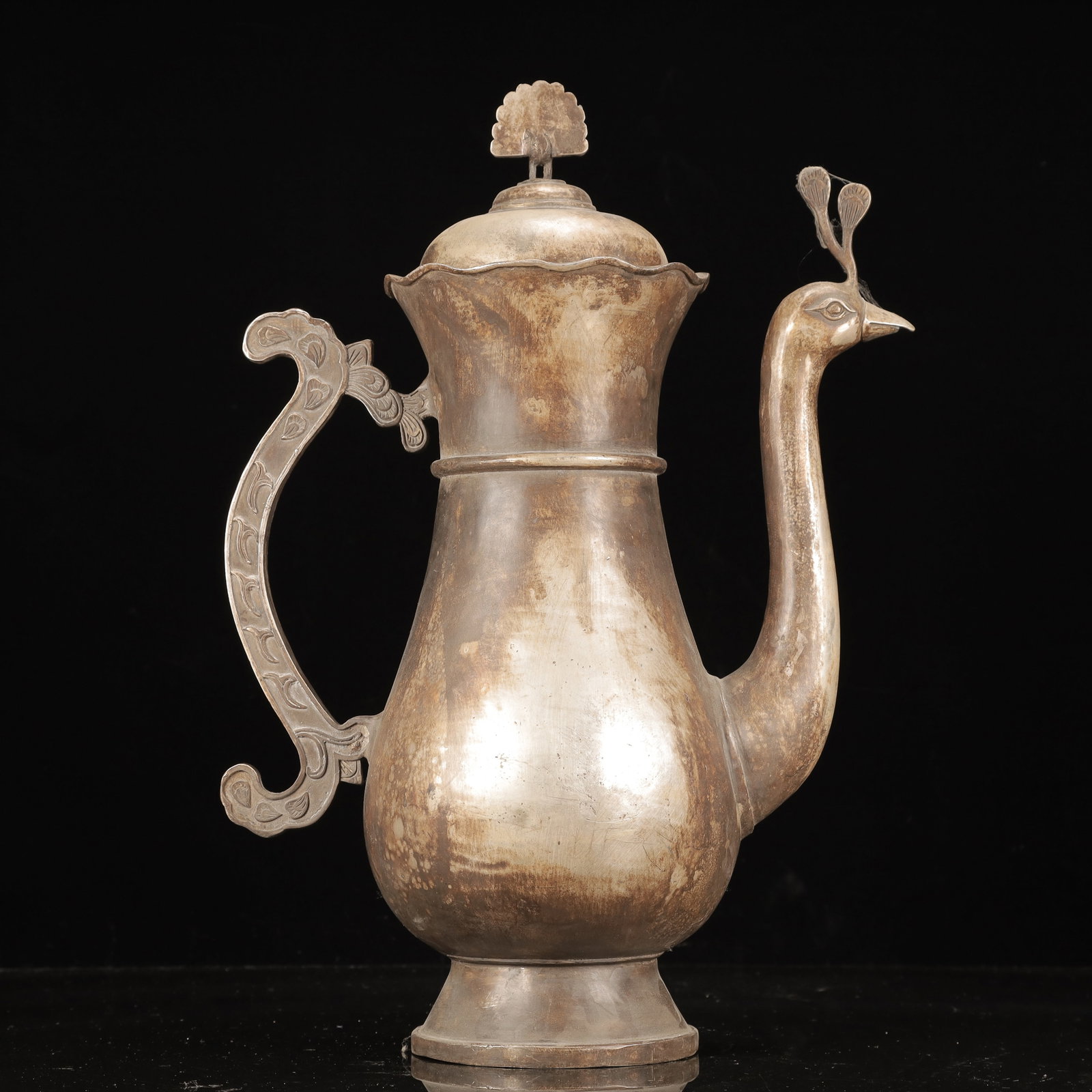 A Huge Silver-Plated Bronze Peacock Pattern Ewer: A Huge Silver-Plated Bronze Peacock Pattern Ewer,Qing Dynasty, China, Qianlong Four-character Mark,Size:12.2inx6.7inx17.7in,Weight:5950g 铜镀银孔雀纹执壶