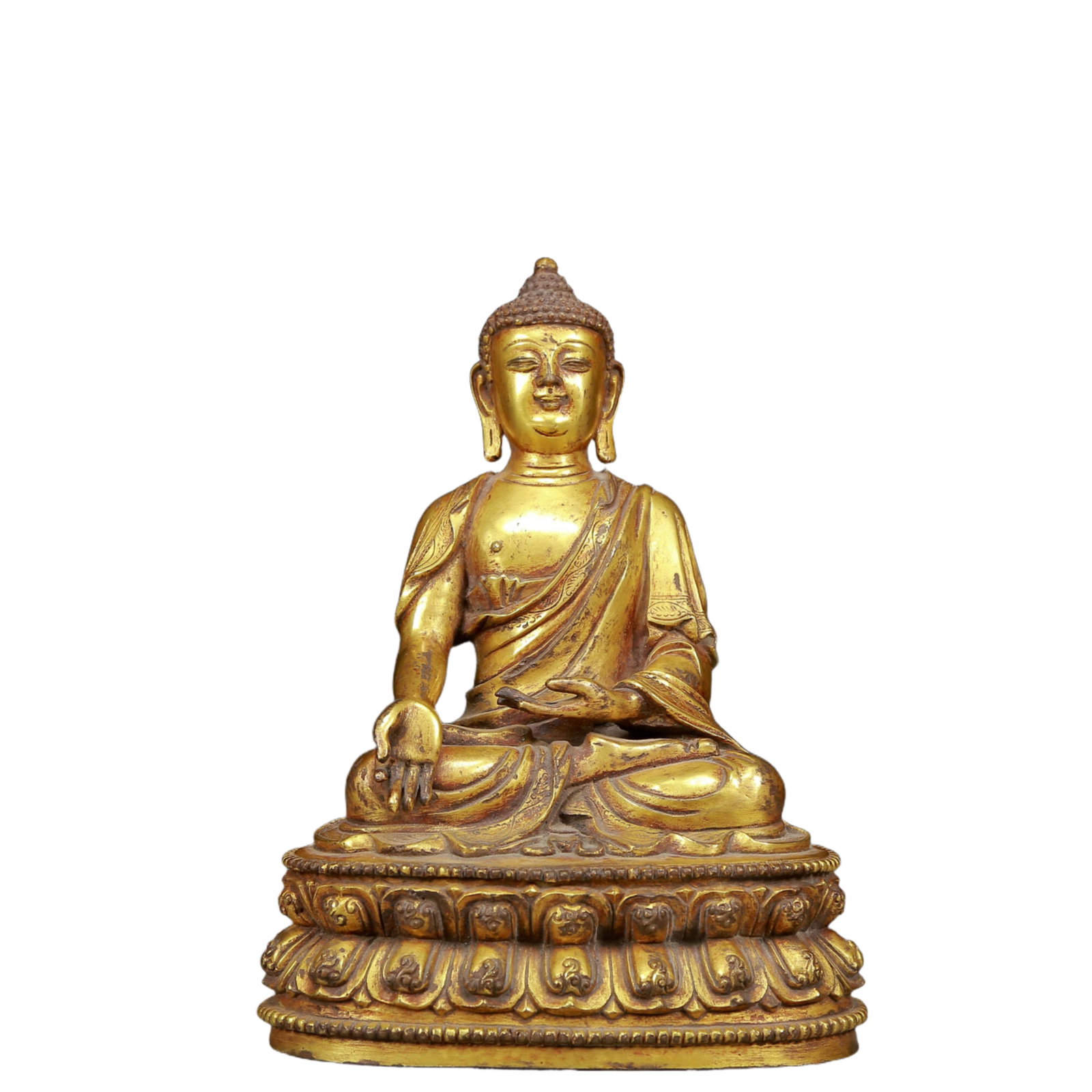 A Solemn Gilt Bronze Statue of Sakyamuni: A Solemn Gilt Bronze Statue of Sakyamuni,Ming Dynasty, China,Size:6.7inx5.1inx9.4in,Weight:3475g 铜鎏金释迦摩尼像，明代