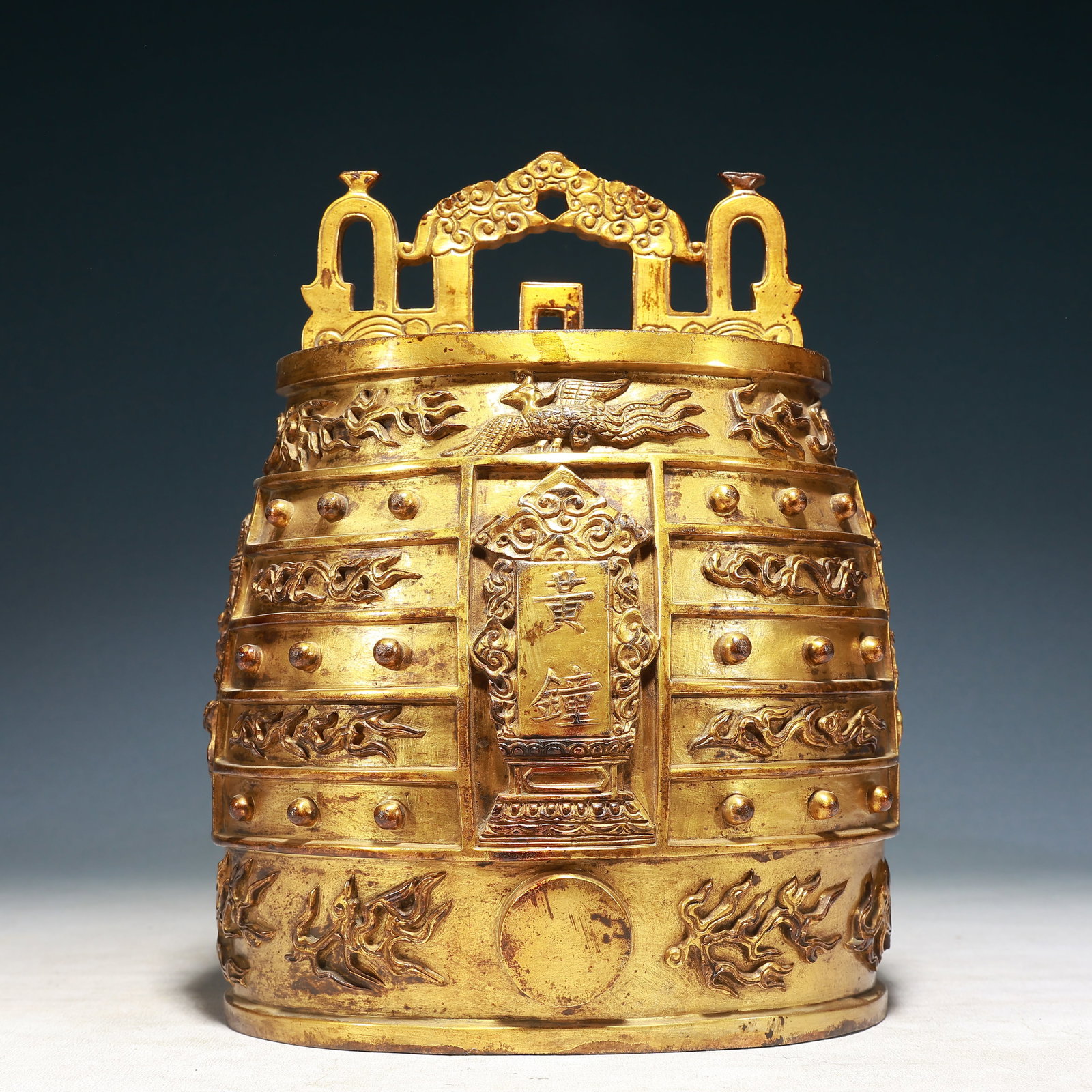 An Exquisite Gilt Bronze Dragon and Phoenix Pattern Chime: An Exquisite Gilt Bronze Dragon and Phoenix Pattern Chime,Qing Dynasty,China,Size:8.3inx6.7inx11in,Weight:1760g 铜鎏金龙凤纹编钟,中国清