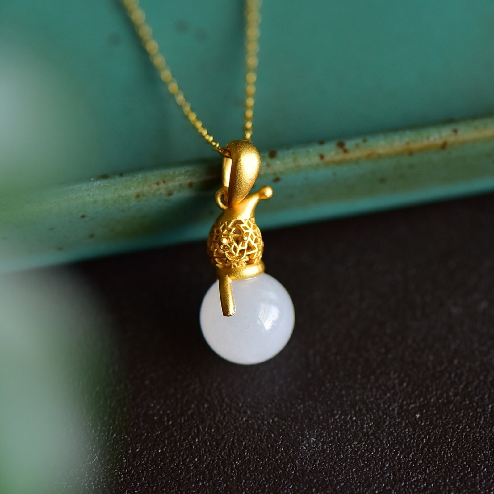 An Exquisite Sterling Silver-Gold Plated Inlaid White Jade Pendant: An Exquisite Sterling Silver-Gold Plated Inlaid White Jade Pendant 纯银镀金镶白玉吊坠