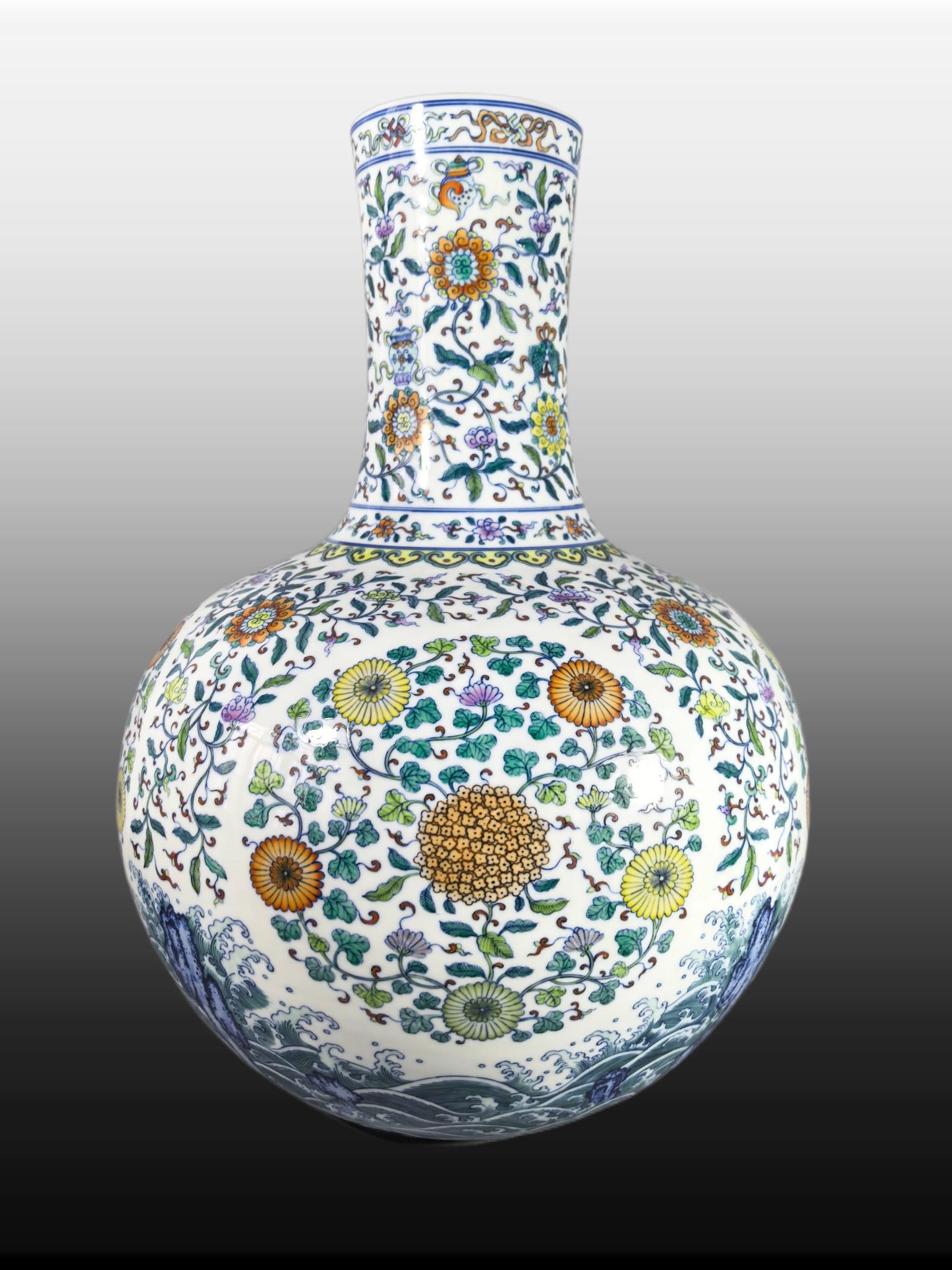 A Exquisite Doucai Flower Pattern Vase: A Exquisite Doucai Flower Pattern Vase,Qing Dynasty, China,Yongzheng Six-character Mark,Size:21.7inx4.8inx16.1inx7.6in