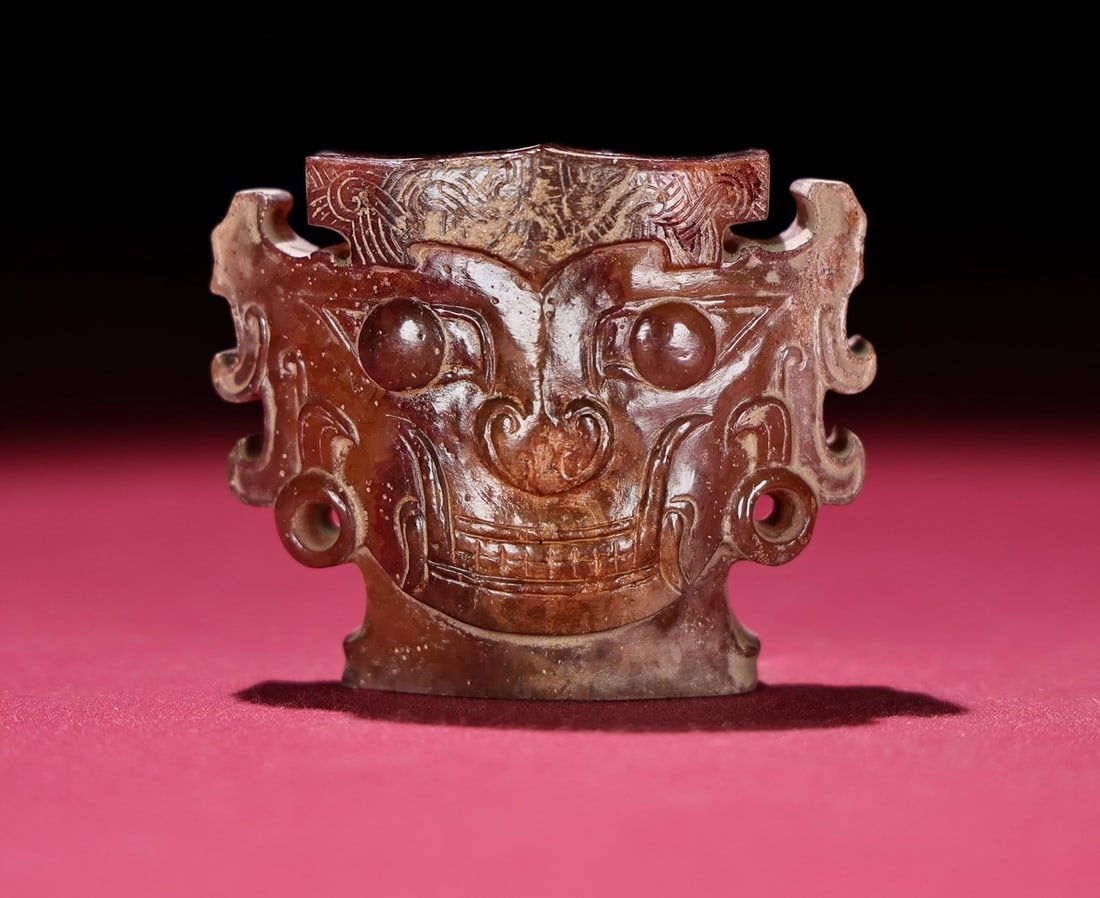 A Exquisite Hetian Stone Mythical Human Head Ornament: A Exquisite Hetian Stone Mythical Human Head Ornament,Han Dynasty, China,Size:2inx2.2inx0.7in,Weight:93g 和田石人首摆件,中国汉代
