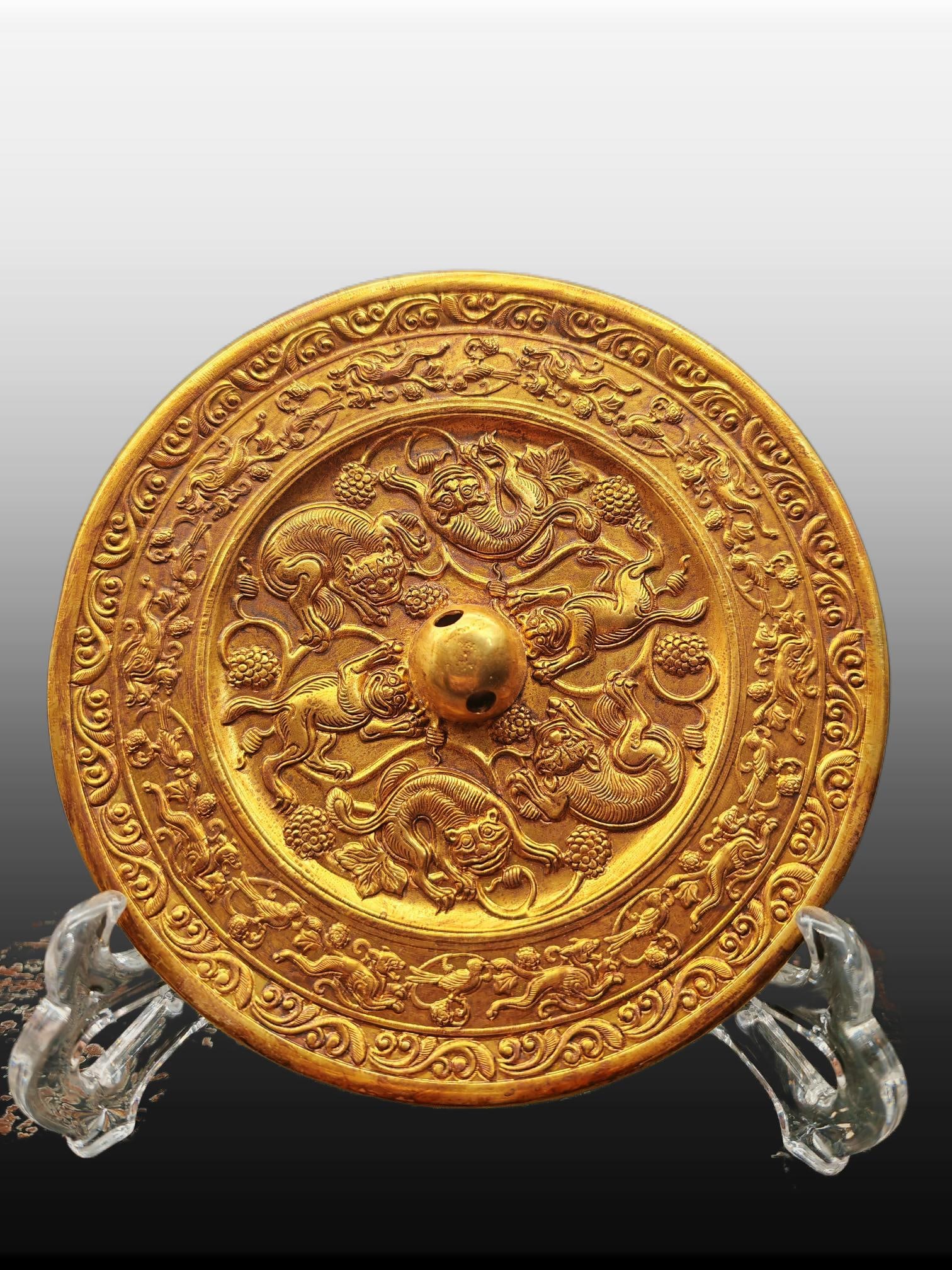 A Exquisite Gilt Bronze Auspicious Beast Pattern Mirror: A Exquisite Gilt Bronze Auspicious Beast Pattern Mirror,Han Dynasty, China,Size:6.3in 铜鎏金瑞兽纹镜,中国汉代