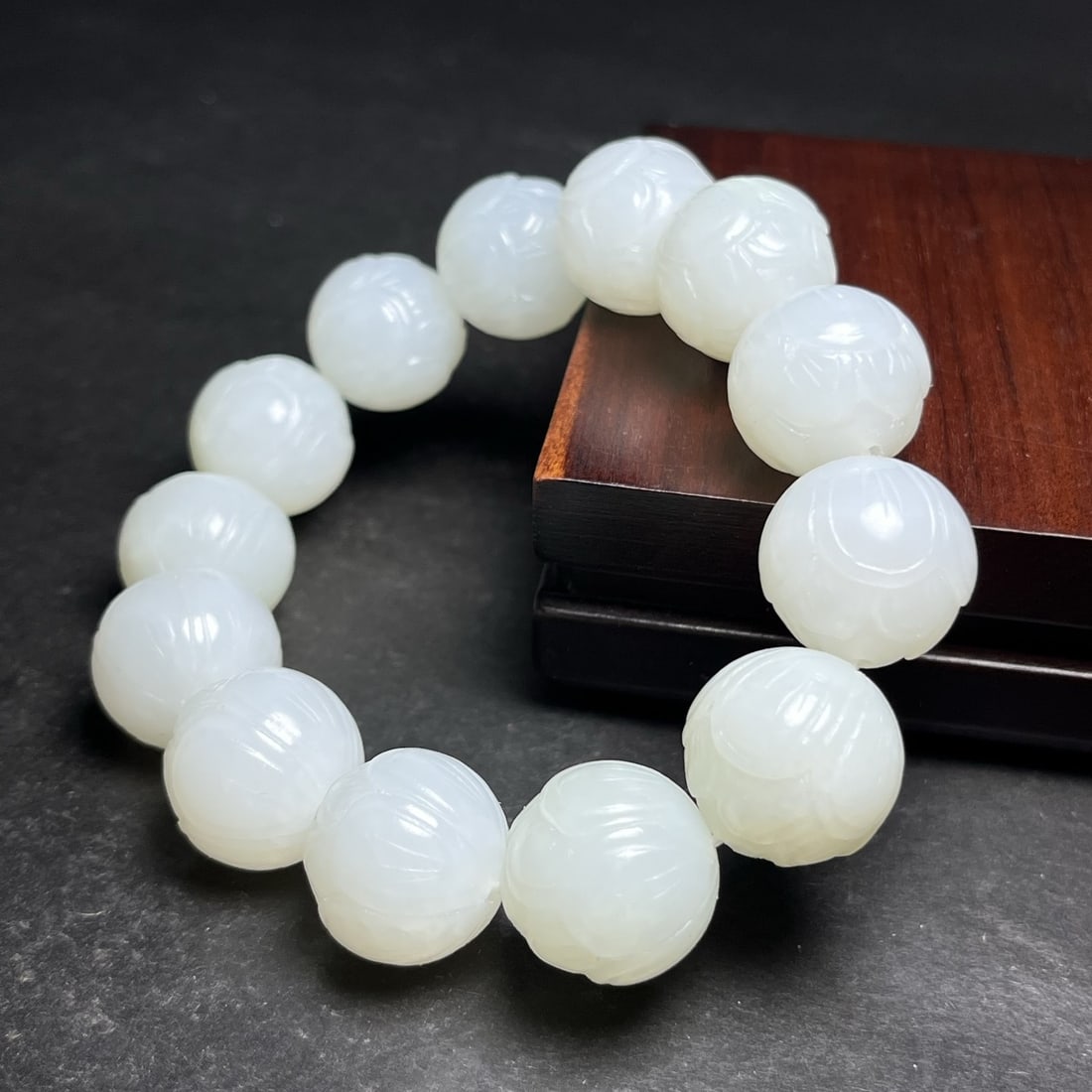 A Exquisite Hotan Jade Lotus Bracelets: A Exquisite Hotan Jade Lotus Bracelets,Qing Dynasty, China,Size:0.7in,Weight:106g 和田玉莲花手链,中国清代