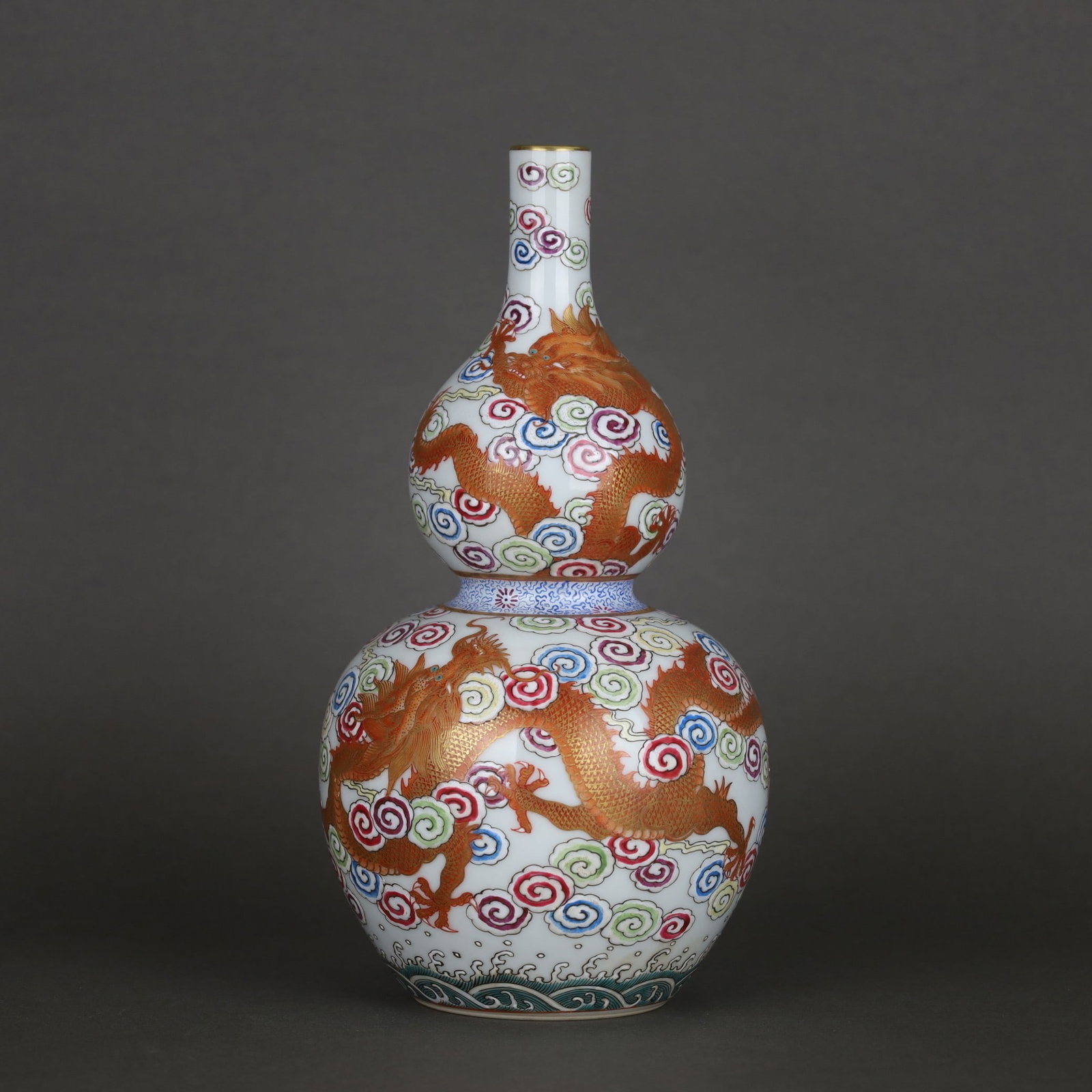 A Exquisite Famille Rose Iron Red Painted Gold Dragon Pattern Gourd Shape Vase: A Exquisite Famille Rose Iron Red Painted Gold Dragon Pattern Gourd Shape Vase,Qing Dynasty, China,Yongzheng Six-character Mark,Size:8.7inx4.5in