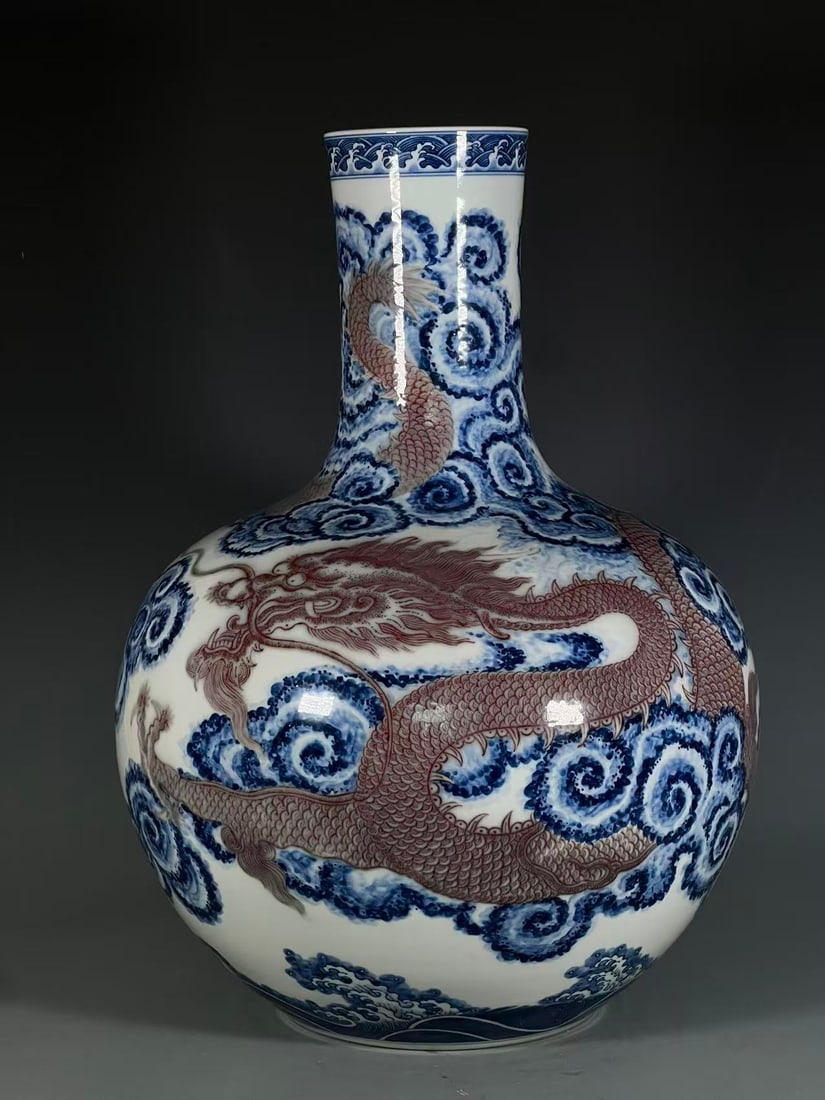 A Exquisite Blue and White Underglaze-Red Dragon Pattern Vase: A Exquisite Blue and White Underglaze-Red Dragon Pattern Vase,Qing Dynasty, China,Qianlong Six-character Mark,Size:20.9inx4.6inx7.5in 青花釉里红龙纹瓶,&