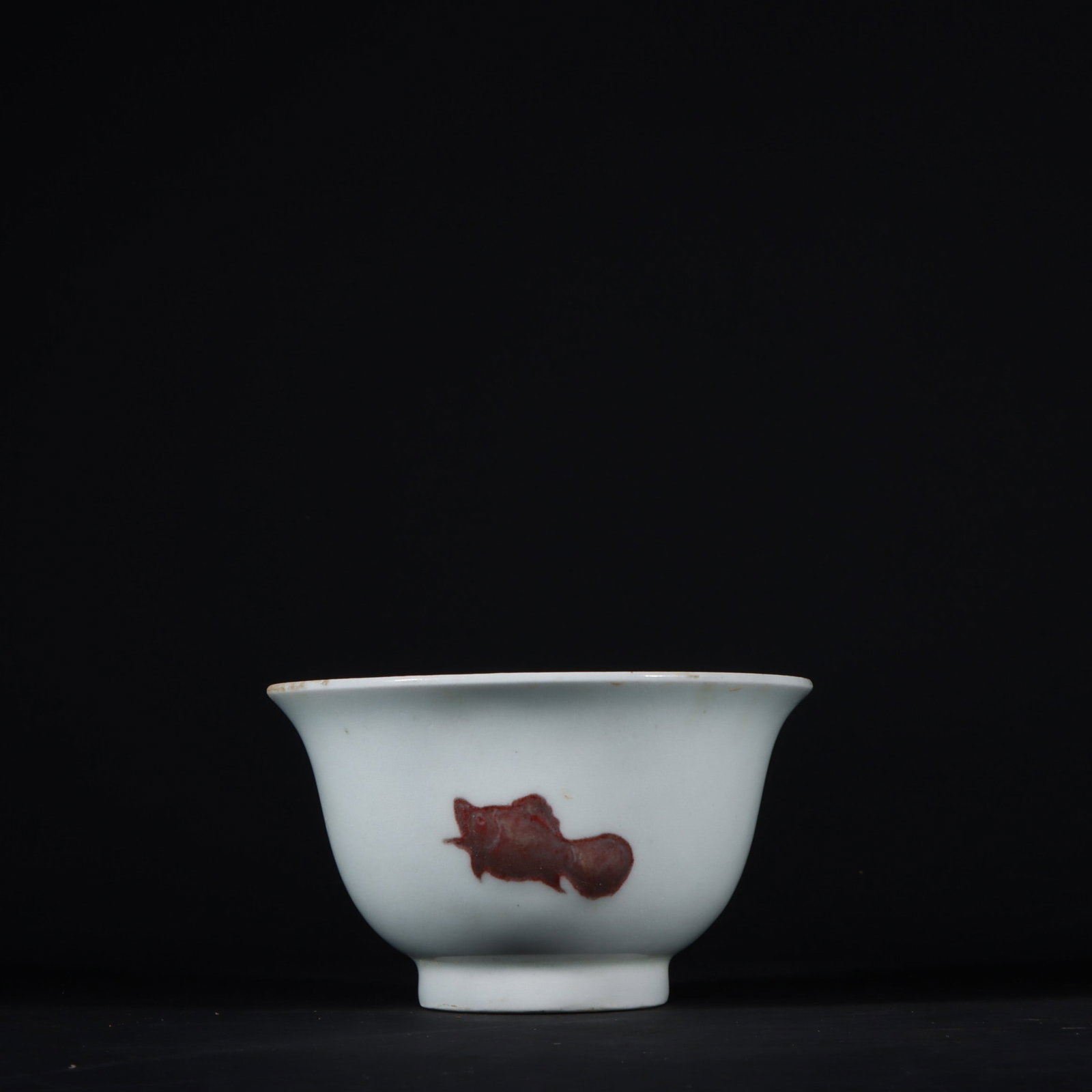 A Exquisite Underglaze-Red Fish Pattern Cup: A Exquisite Underglaze-Red Fish Pattern Cup,Ming Dynasty, China,Xuande Six-character Mark,Size:2.4inx3.9in 釉里红鱼纹杯,中国明代,宣
