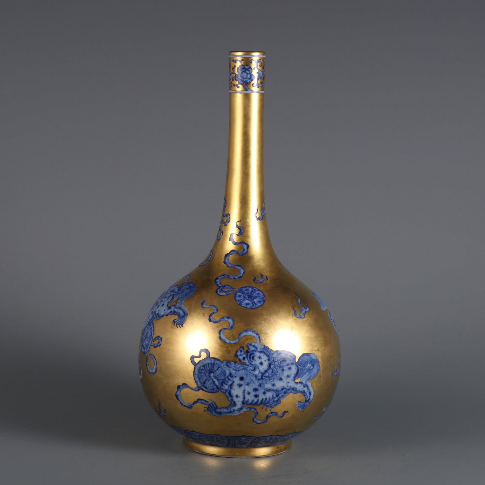 A Exquisite Gold Ground Blue and White Lion Pattern Vase: A Exquisite Gold Ground Blue and White Lion Pattern Vase,Qing Dynasty, China,Yongzheng Six-character Mark,Size:10.3inx5.1in