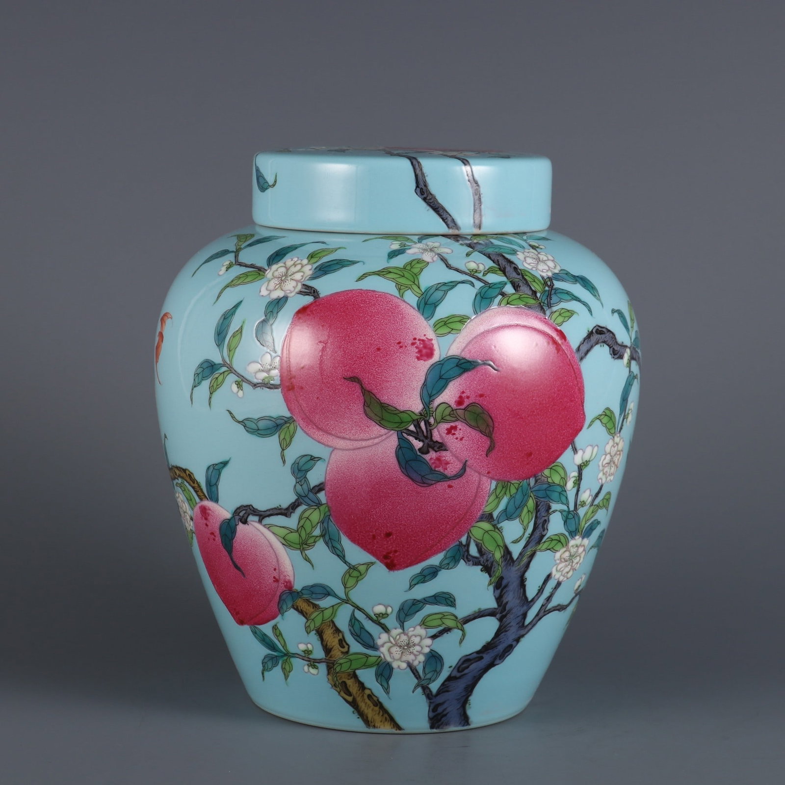 A Exquisite Turquoise-Glazed Ground Peach Pattern Jar: A Exquisite Turquoise-Glazed Ground Peach Pattern Jar,Qing Dynasty, China,Yongzheng Four-character Mark,Size:7.7inx3.3in 松石绿地桃纹罐,中国଀