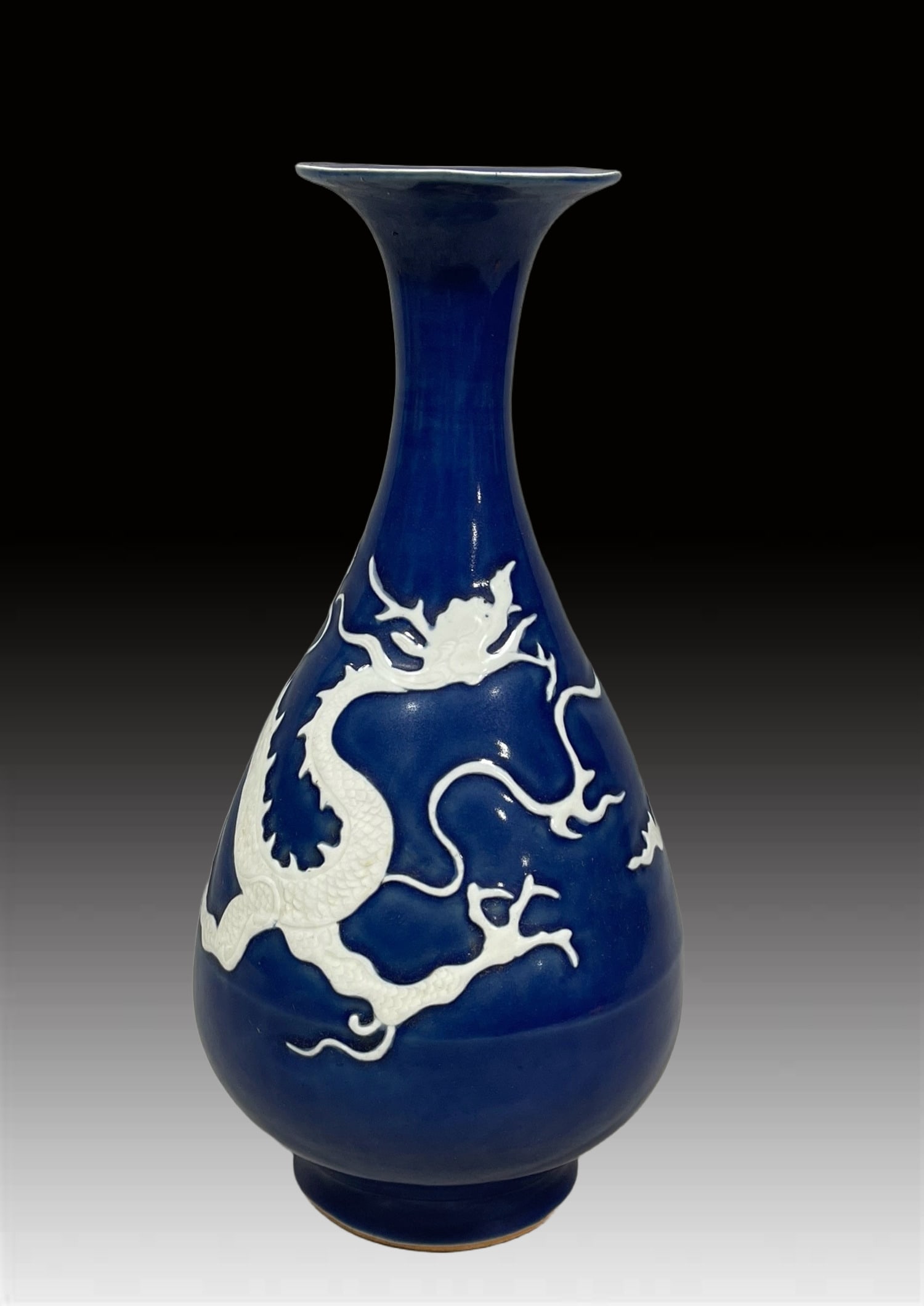 A Exquisite Ji Blue Glazed Dragon Pattern Vase: A Exquisite Ji Blue Glazed Dragon Pattern Vase,Qing Dynasty, China,Size:11.8inx5.9in 霁蓝釉龙纹瓶,中国清代