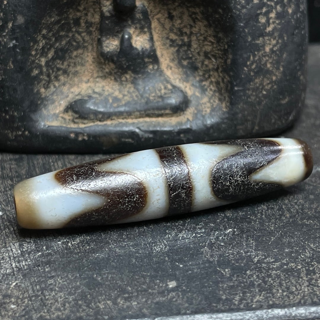 A Exquisite Tiger Tooth Dzi bead - 2